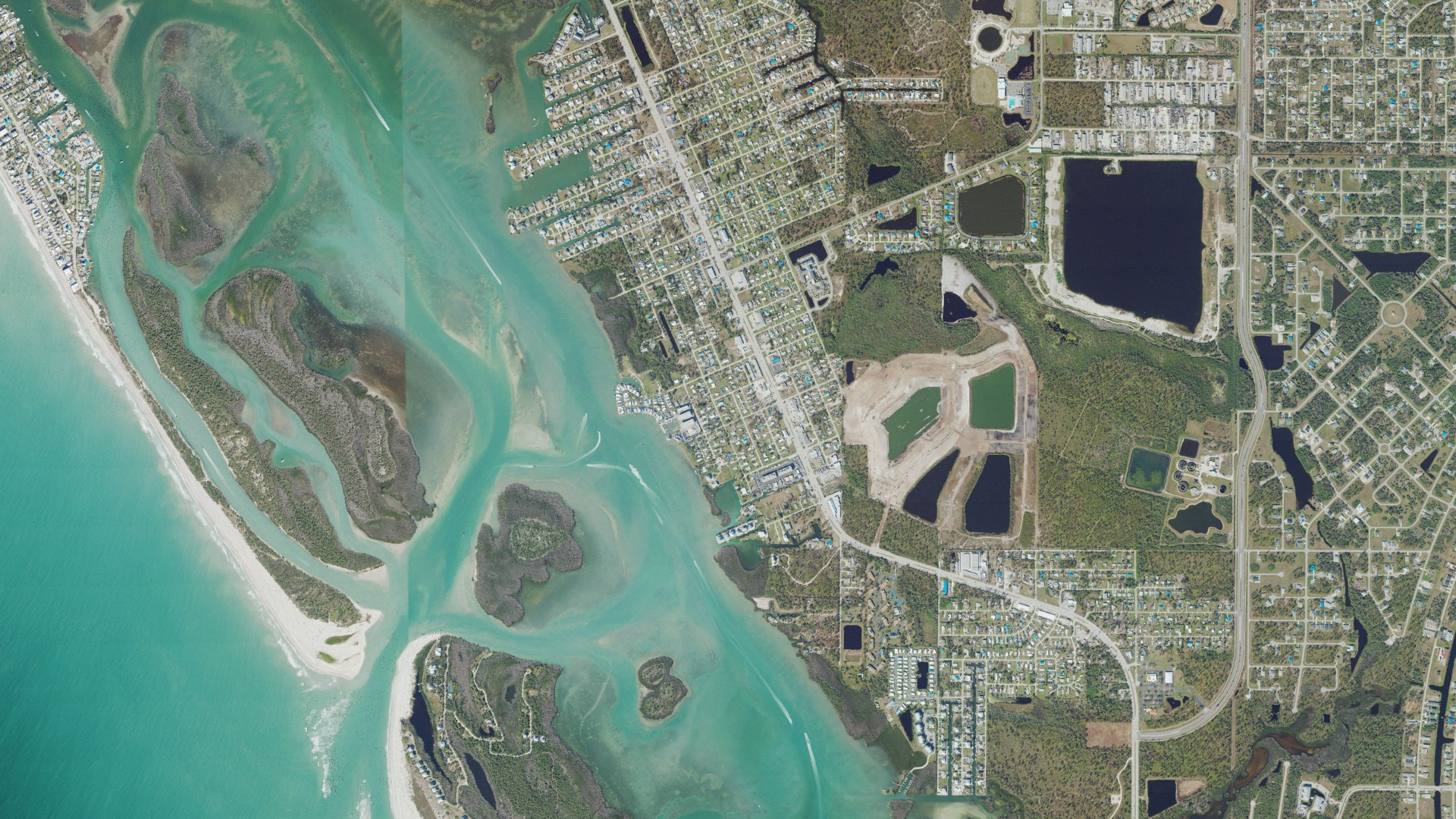 Natural-color aerial photograph of land around Grove City, Florida