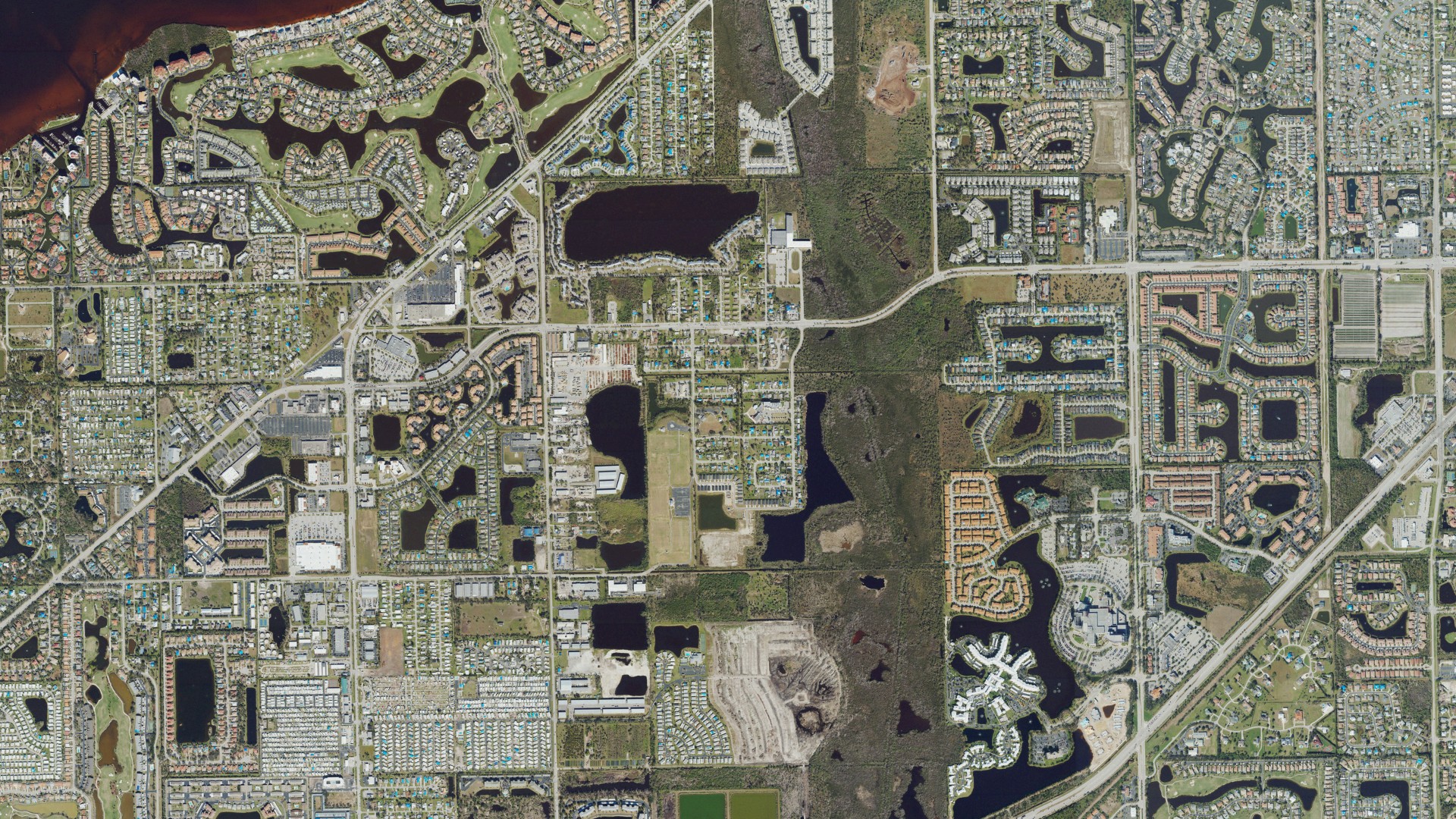 Natural-color aerial photograph of land around Harlem Heights, Florida