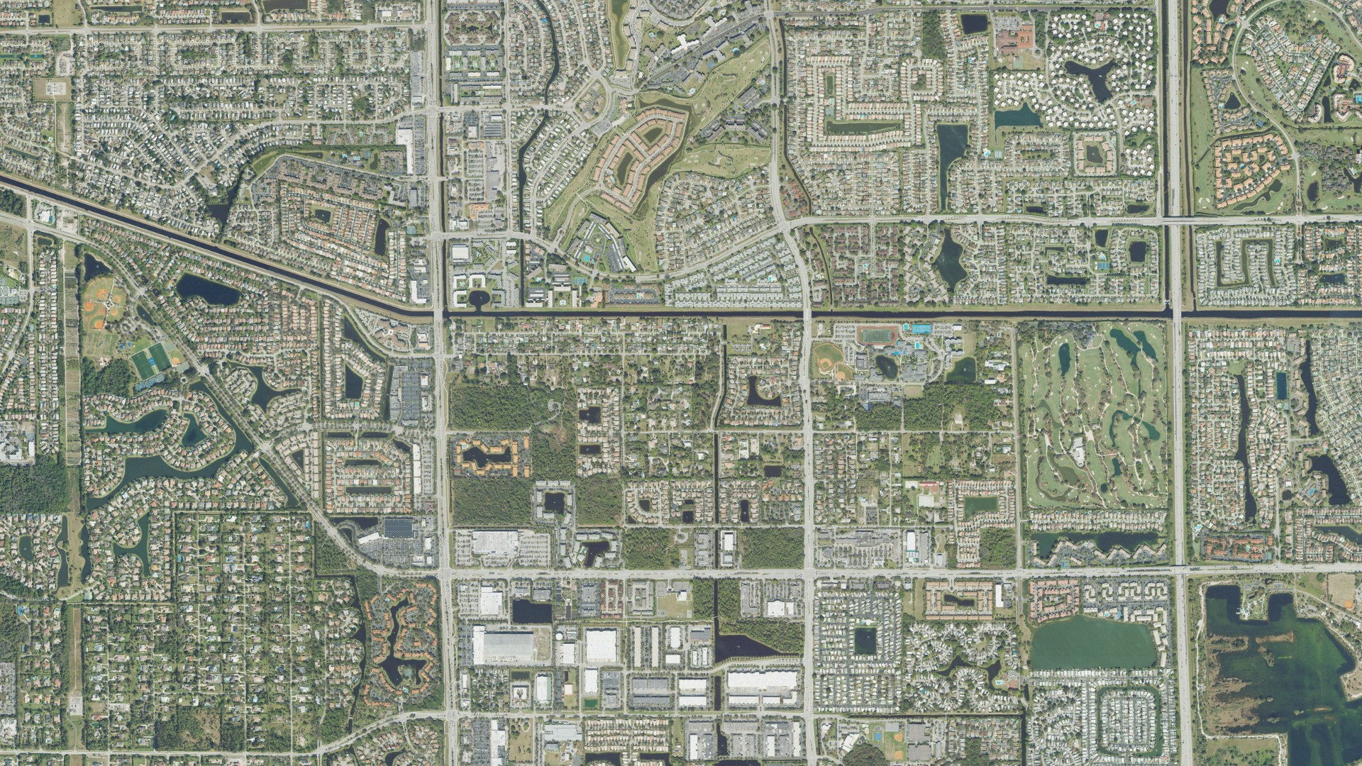 Natural-color aerial photograph of land around Hillsboro Pines, Florida