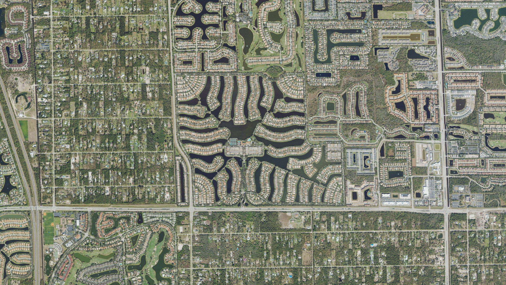 Natural-color aerial photograph of land around Island Walk, Florida