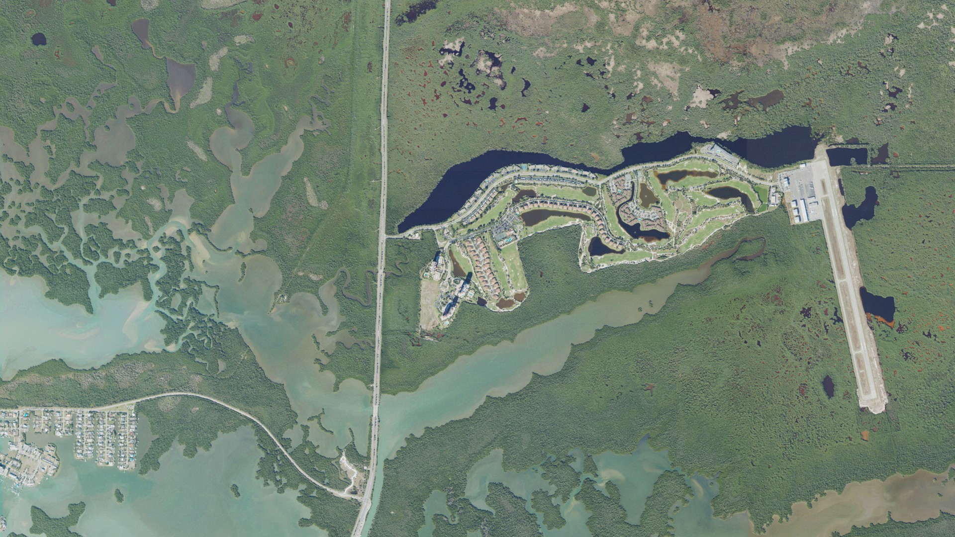 Natural-color aerial photograph of land around Marco Shores-Hammock Bay, Florida
