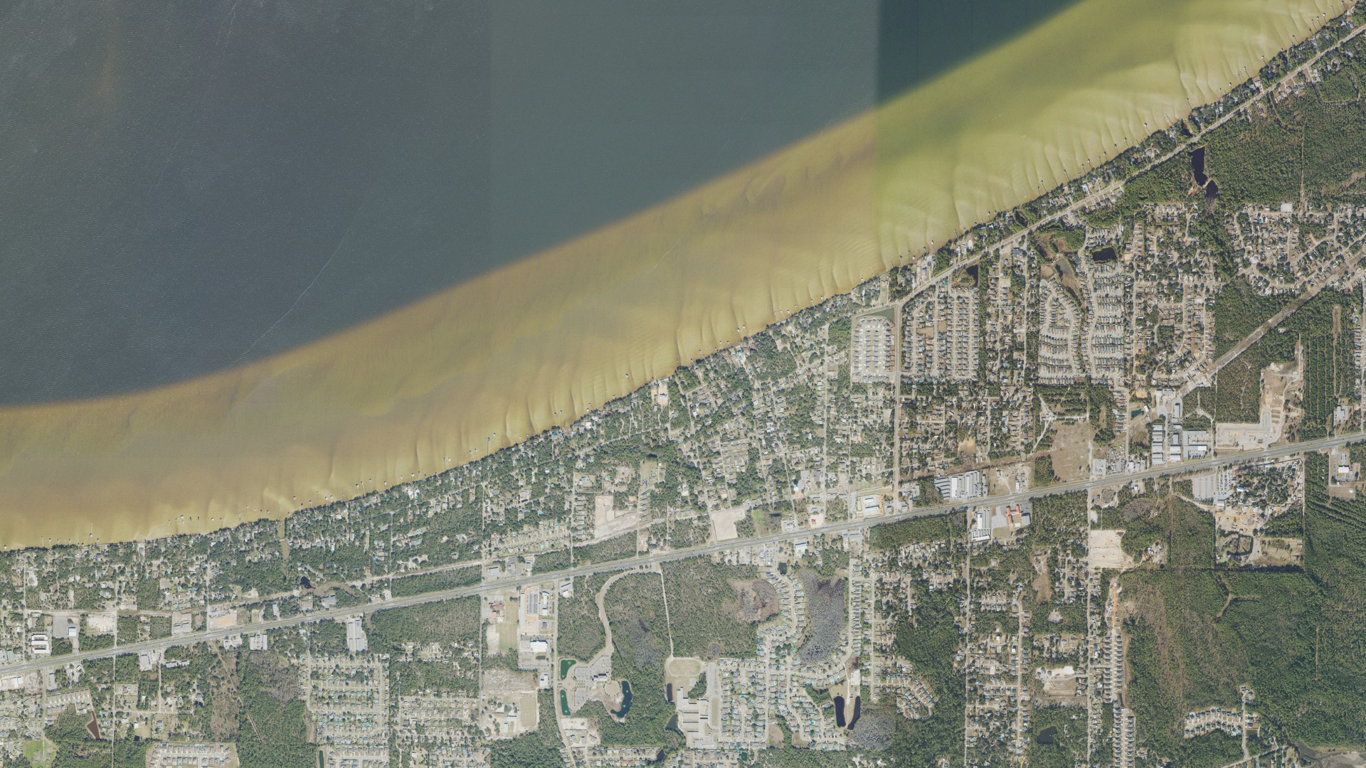 Natural-color aerial photograph of land around Midway, Florida
