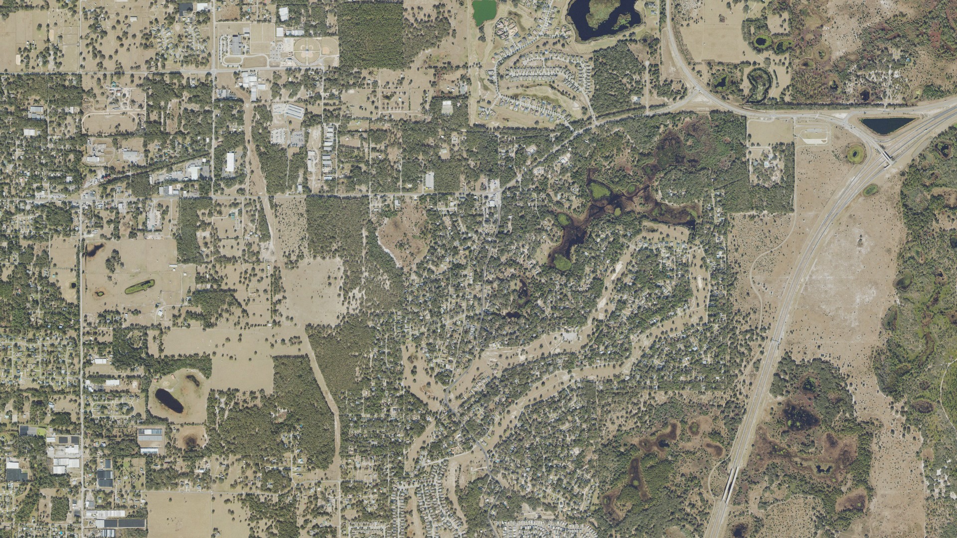 Natural-color aerial photograph of land around Mount Plymouth, Florida