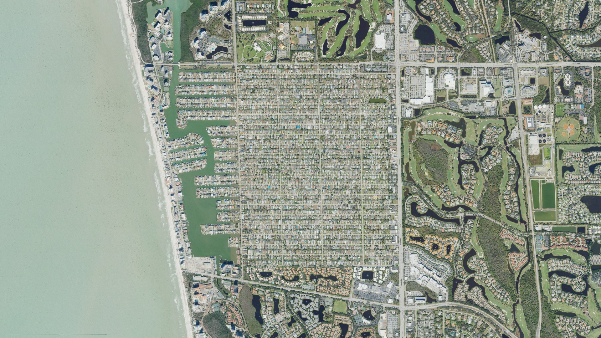 Natural-color aerial photograph of land around Naples Park, Florida
