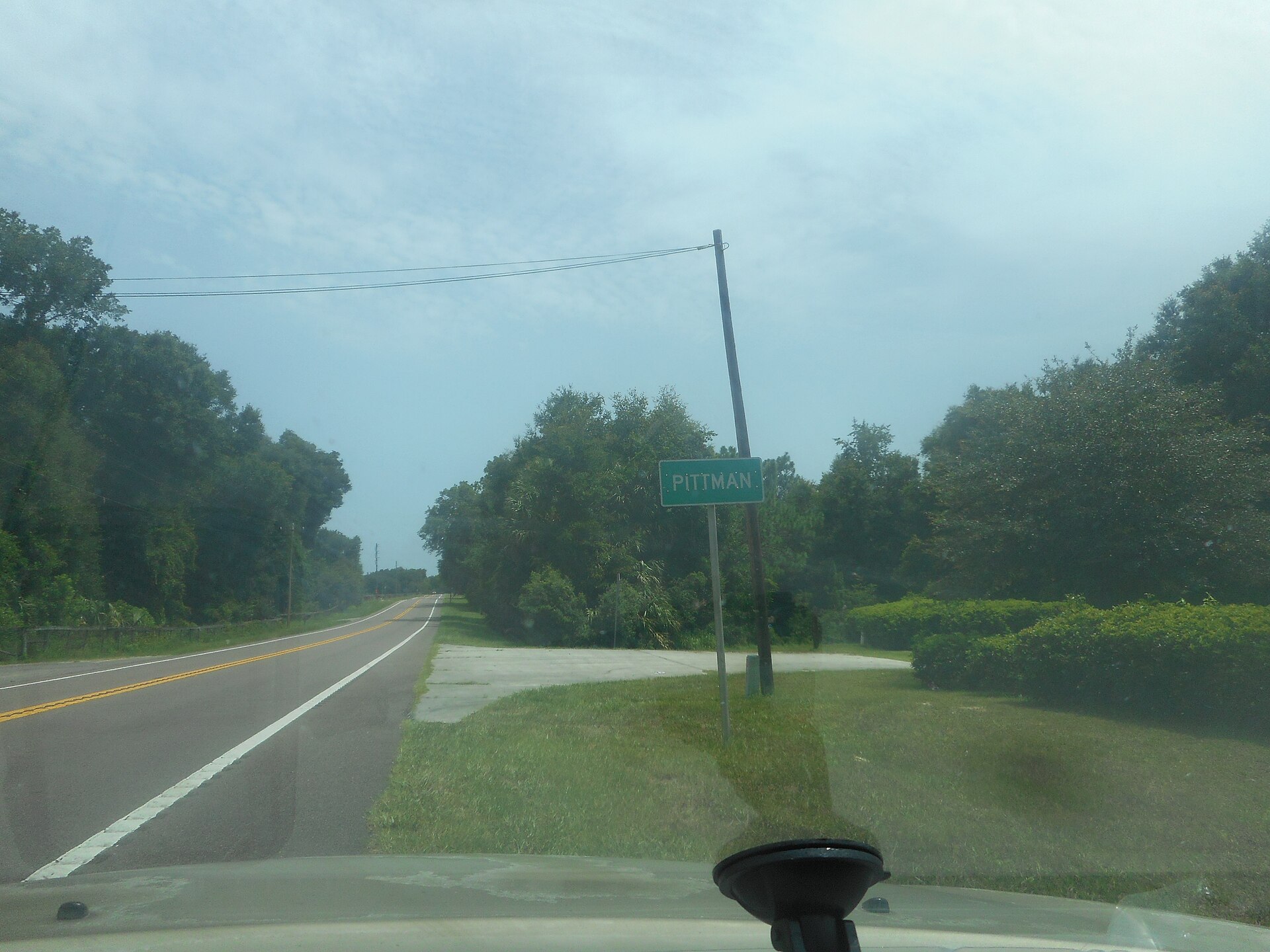 Northbound Florida State Road 19 as it enters the unincorporated community of Pittman, Florida. Taken from my car while pulled off onto the shoulder of the road.
