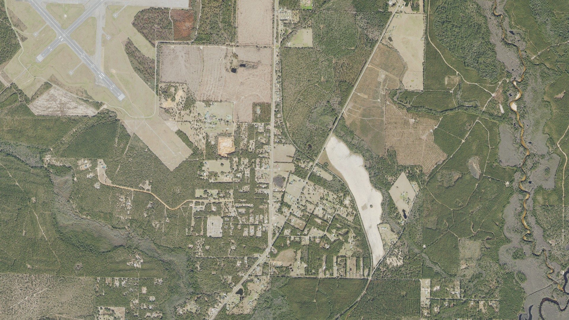 Natural-color aerial photograph of land around Roeville, Florida