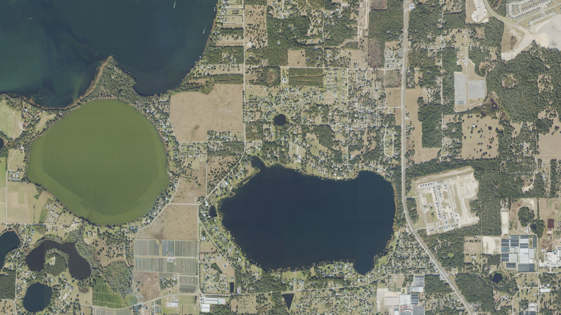 Natural-color aerial photograph of land around Tangerine, Florida