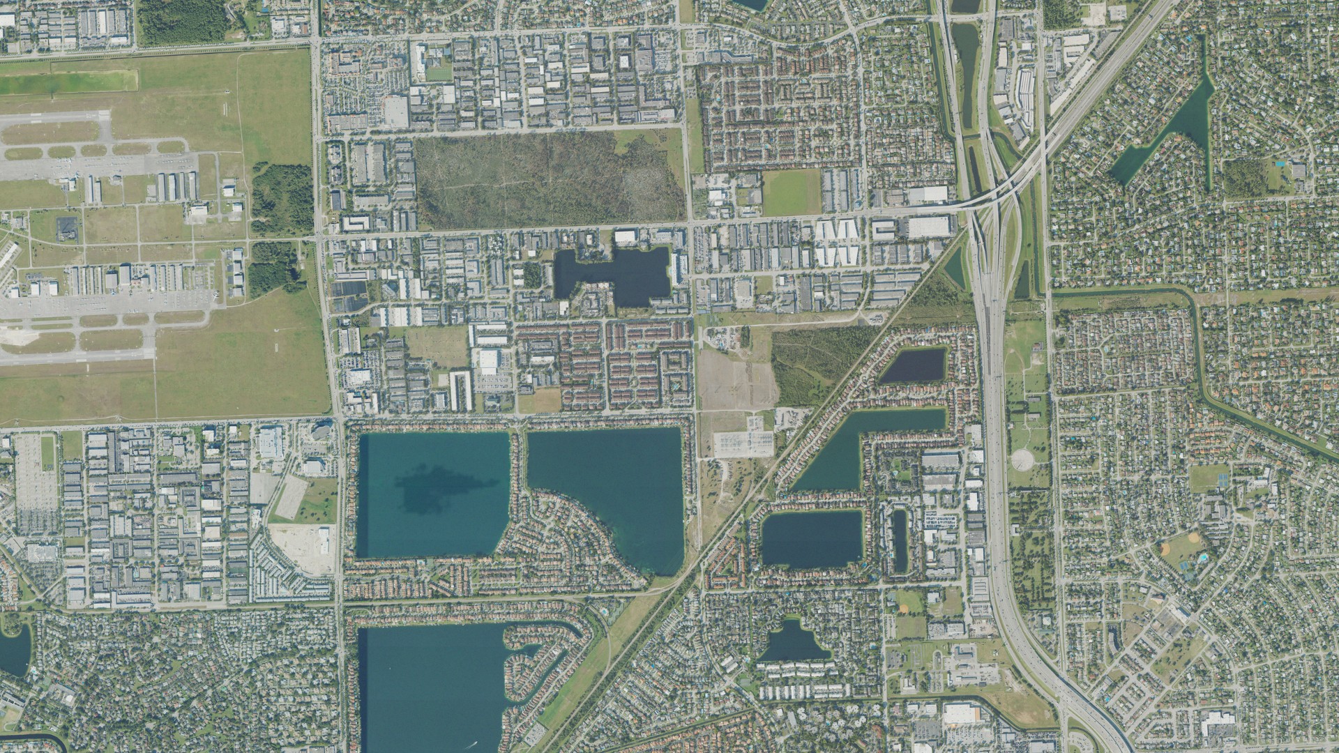 Natural-color aerial photograph of land around Three Lakes, Florida