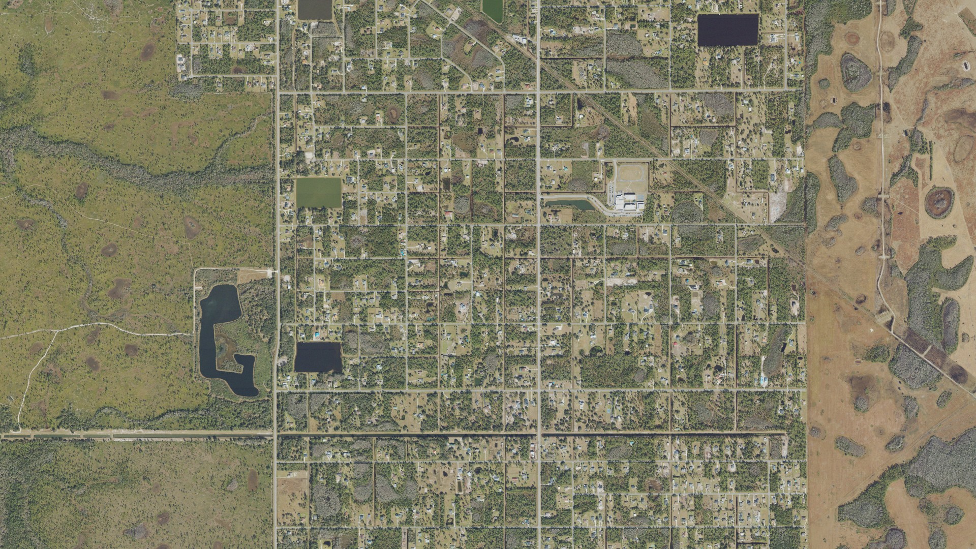 Natural-color aerial photograph of land around Wedgefield, Florida