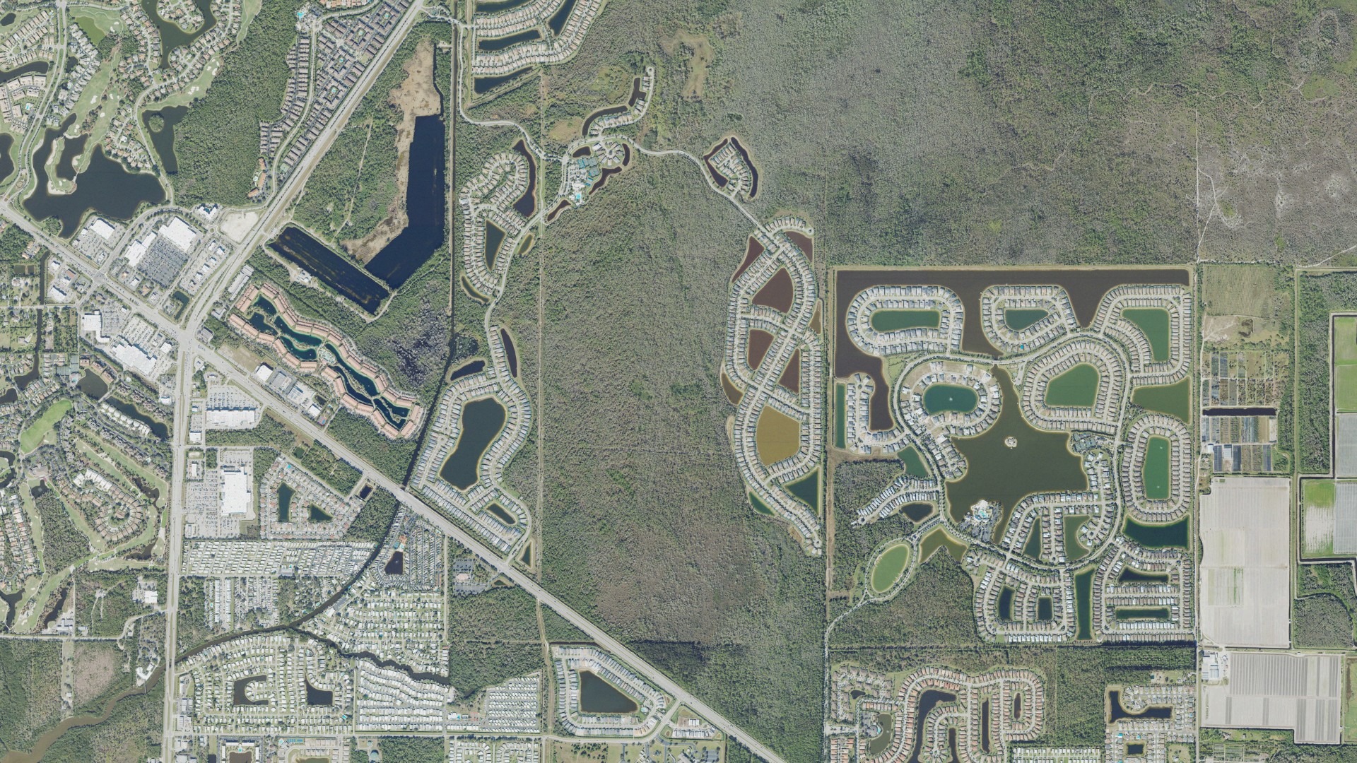 Natural-color aerial photograph of land around Winding Cypress, Florida