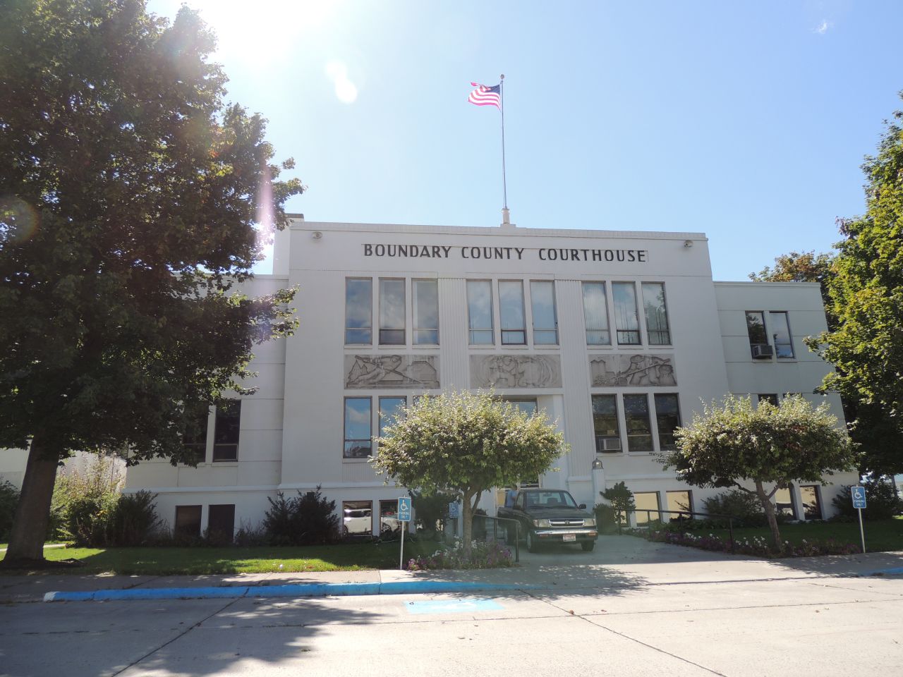 NRHP-listed Boundary County Courthouse in Bonners Ferry, Idaho.The bas-relief panels on the façade – Lumbering, Mining, Farming – were designed by artist Fletcher Martin. The Living New Deal