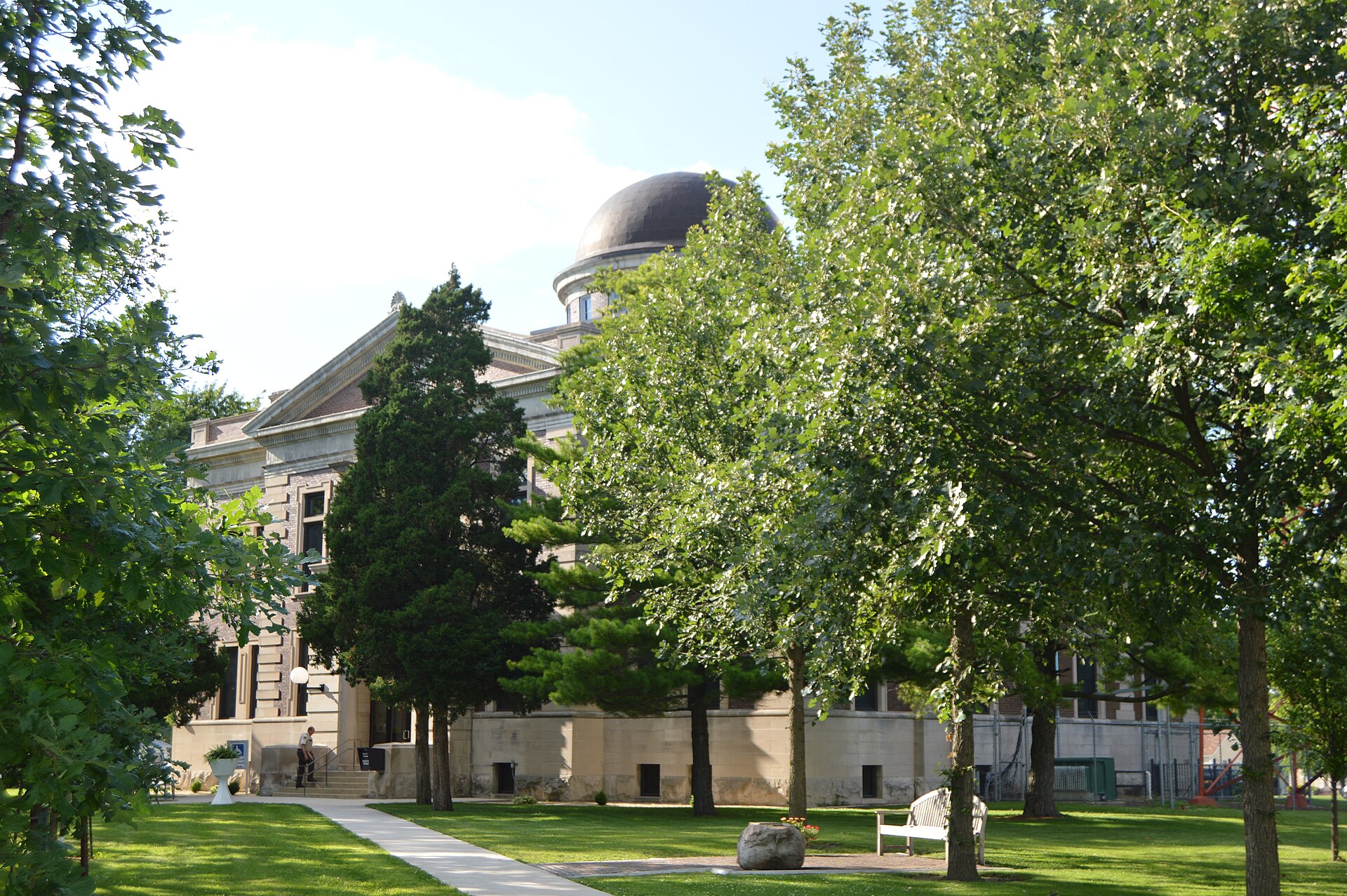 Front and eastern side of the Ford County Courthouse, located at 200 W. State Street in Paxton, Illinois, United States. It was built in 1908.