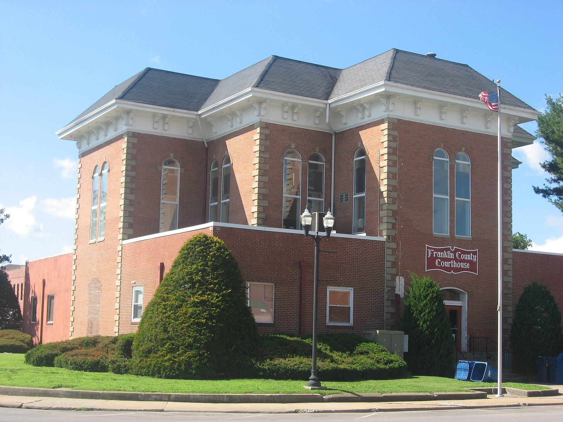 Northern and eastern sides of the Franklin County Courthouse, located at the center of Courthouse Square (Illinois Routes 14/37) in downtown Benton, Illinois, United States. It was built in 1875.