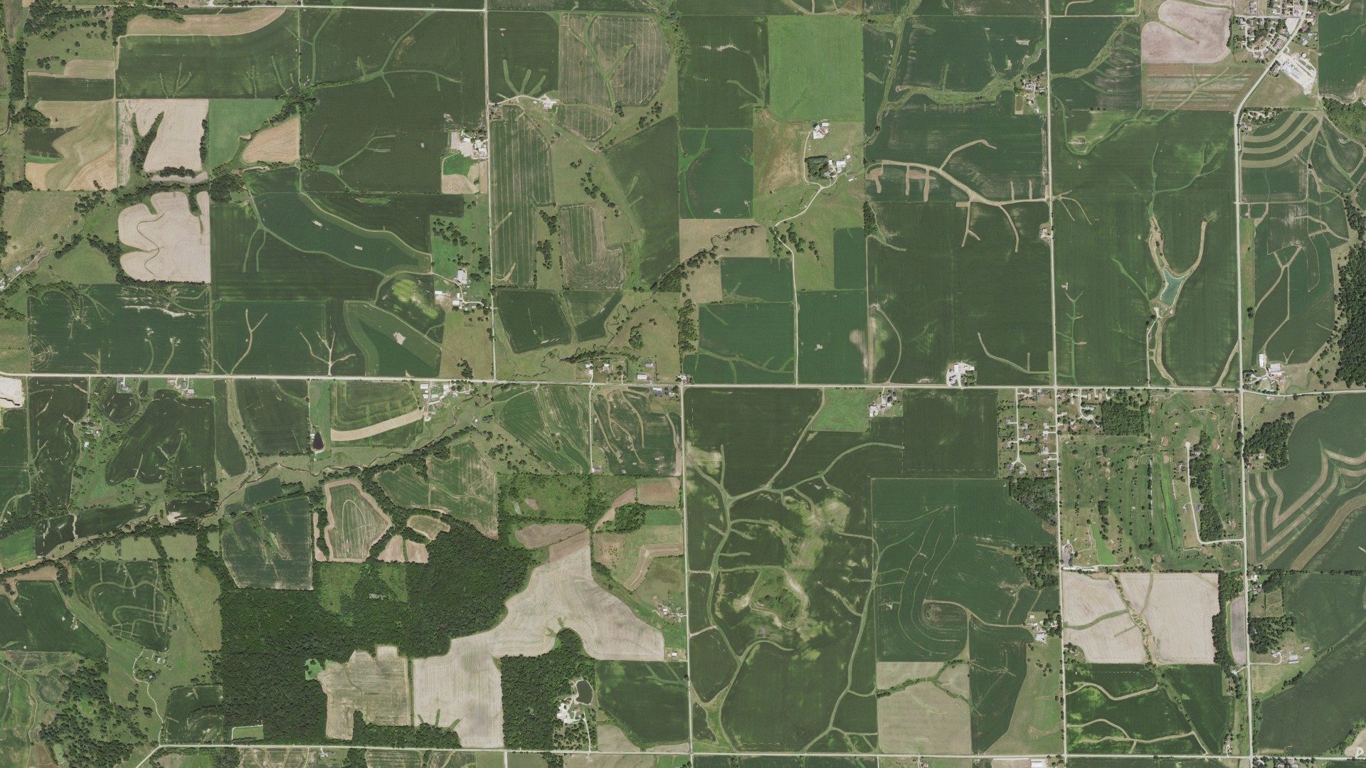 Natural-color aerial photograph of land around Stockton, Illinois