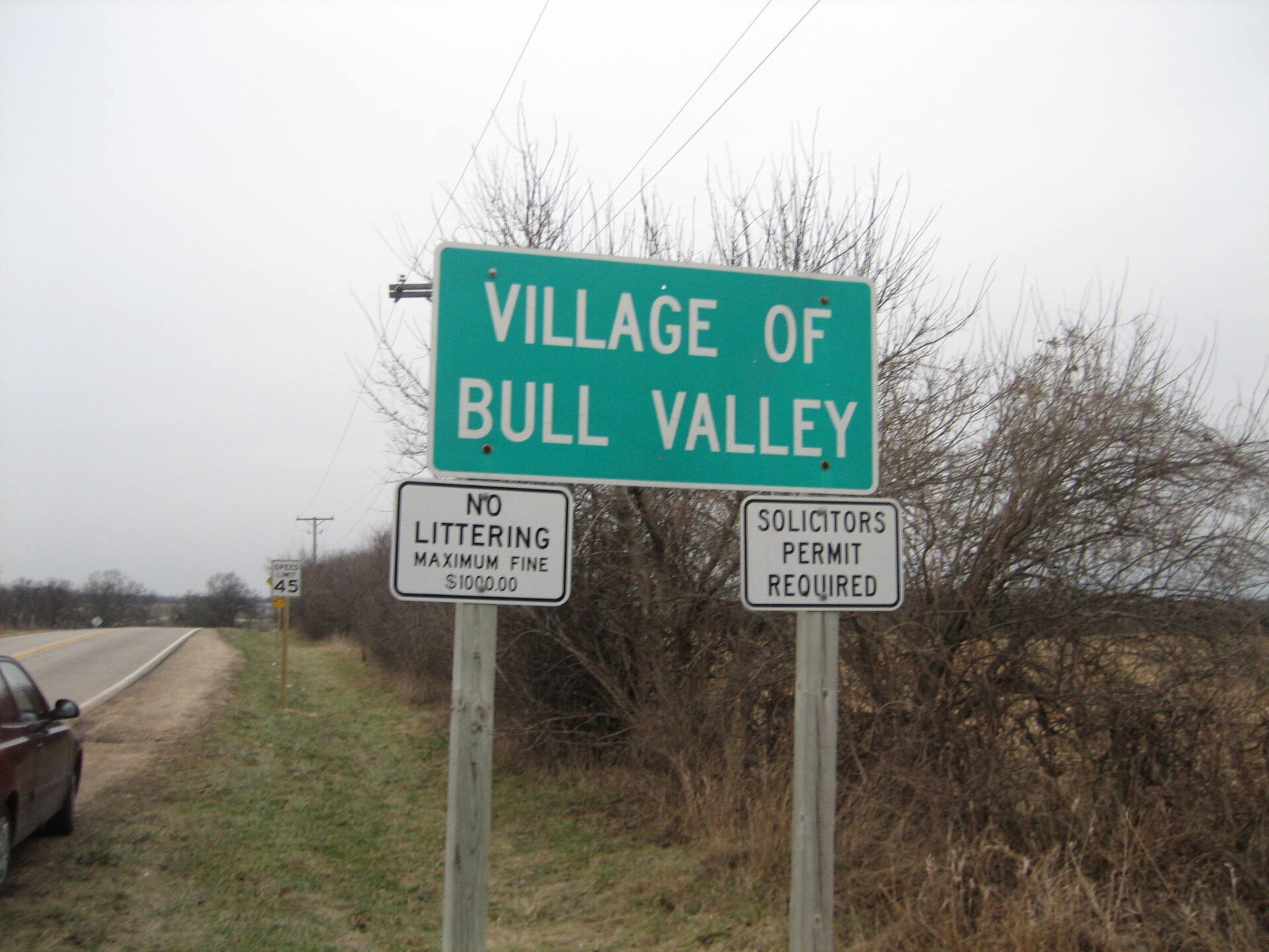 Signage marking village. Bull Valley, Illinois, National Register of Historic Places.