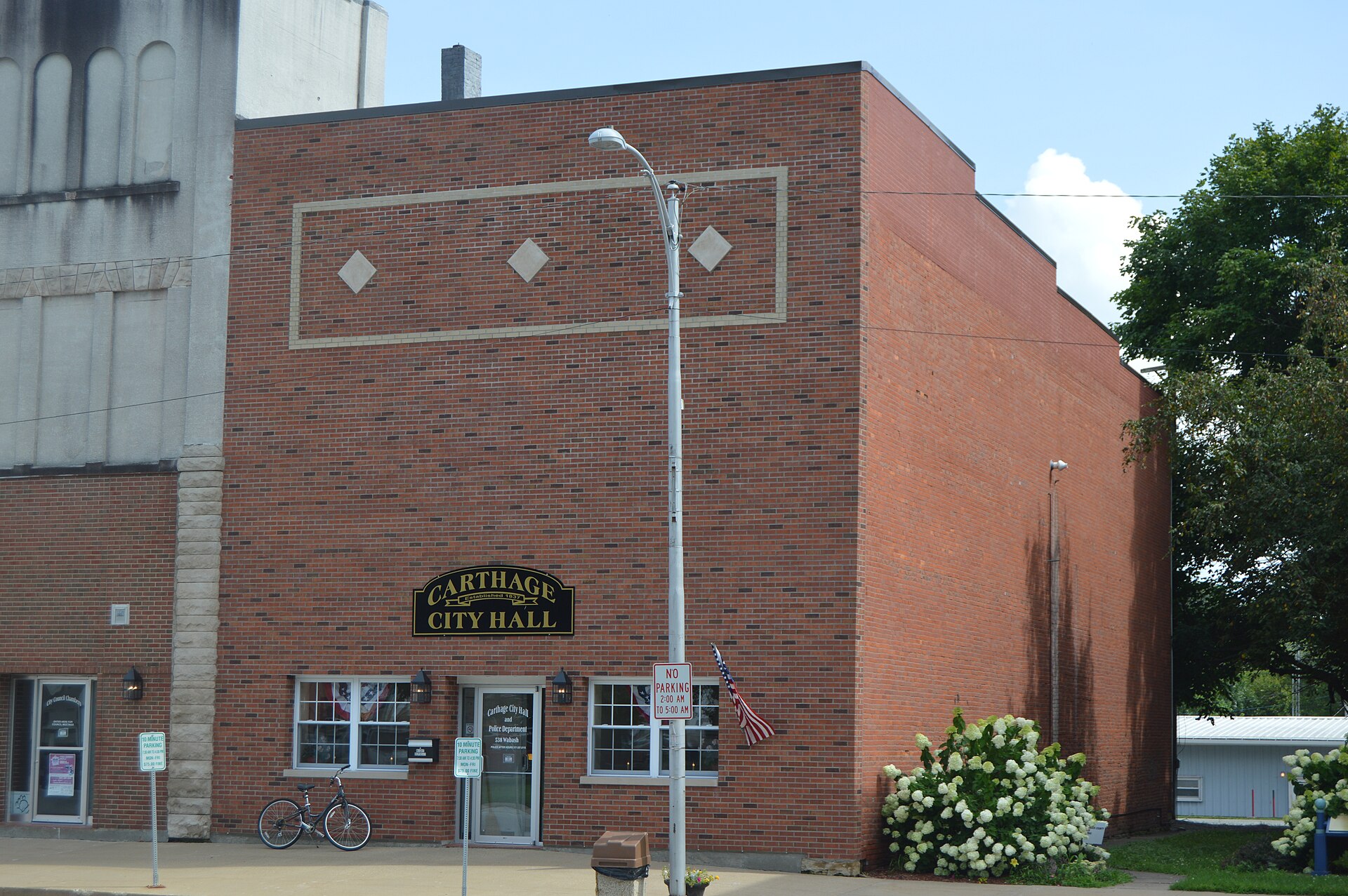 Front of City Hall in Carthage, Illinois, United States, located at 538 Wabash Avenue on the courthouse square. It was built at some point after 1986, replacing the city's 1894 Odd Fellows hall.