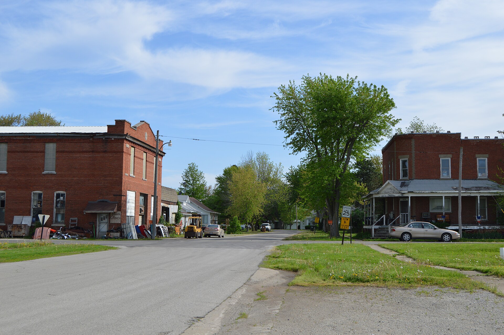 Looking northward on Missouri Street at the Sixth Street intersection in Hindsboro, Illinois, United States. The brick building on the left was constructed in 1910.