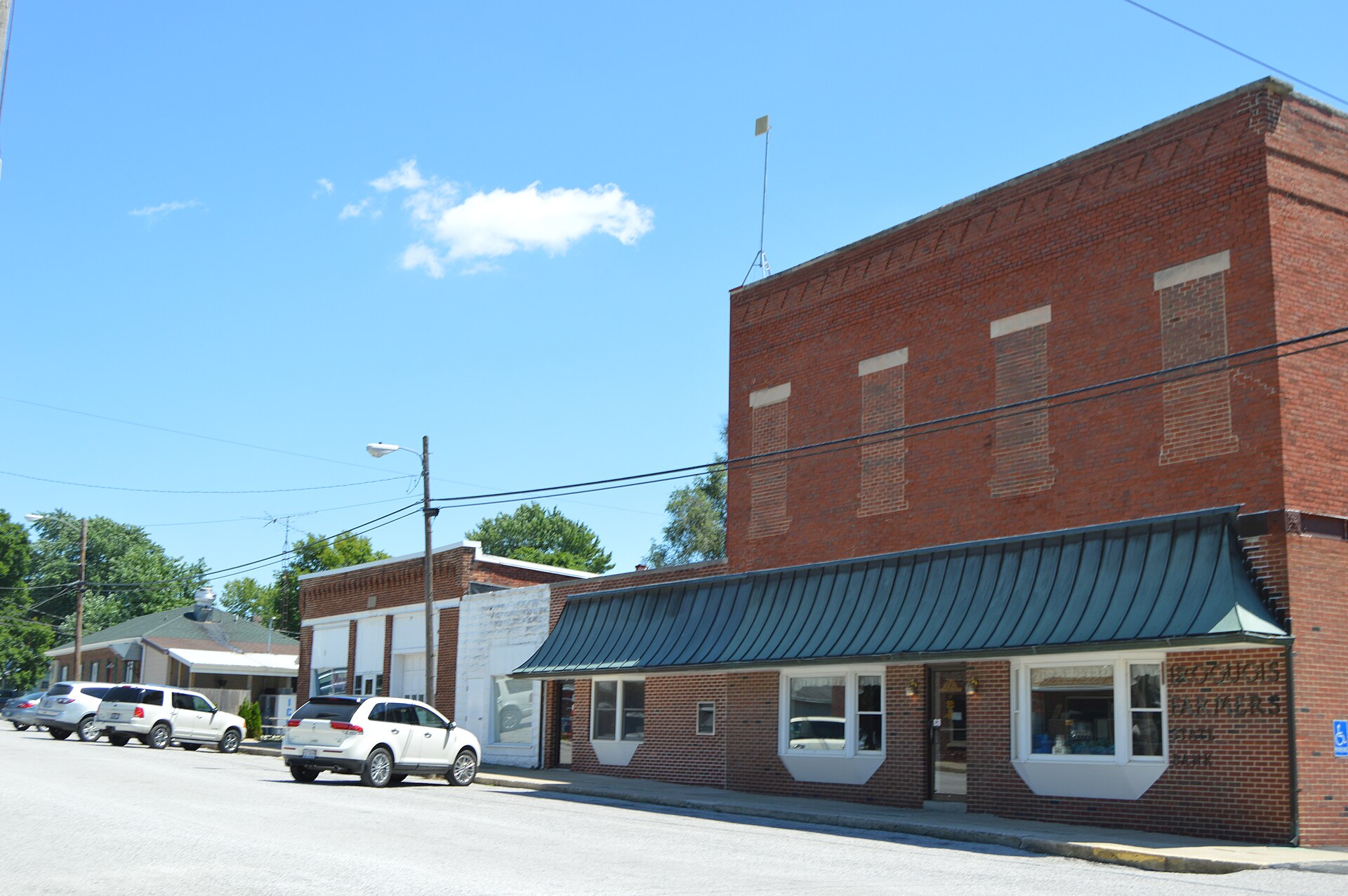 Buildings on the southern side of Lincoln Avenue just east of Hamilton Street in Iroquois, Illinois, United States.