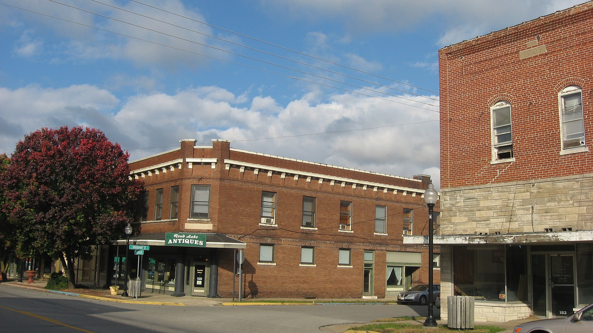 Buildings on the northern corners of the junction of Franklin Street (Illinois Route 154) and Broadway in downtown Sesser, Illinois, United States.