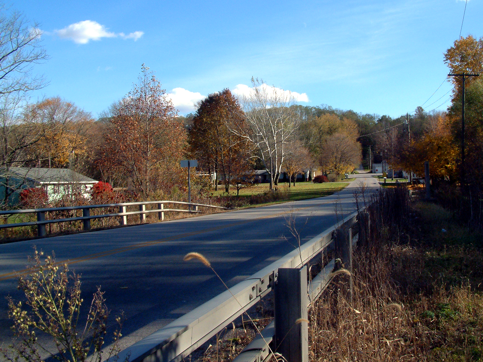 The view southeast toward the small town of Americus, Indiana. This photo was taken from near the Wabash River bridge on Grant Road and looks toward the intersection with Indiana State Road 25.