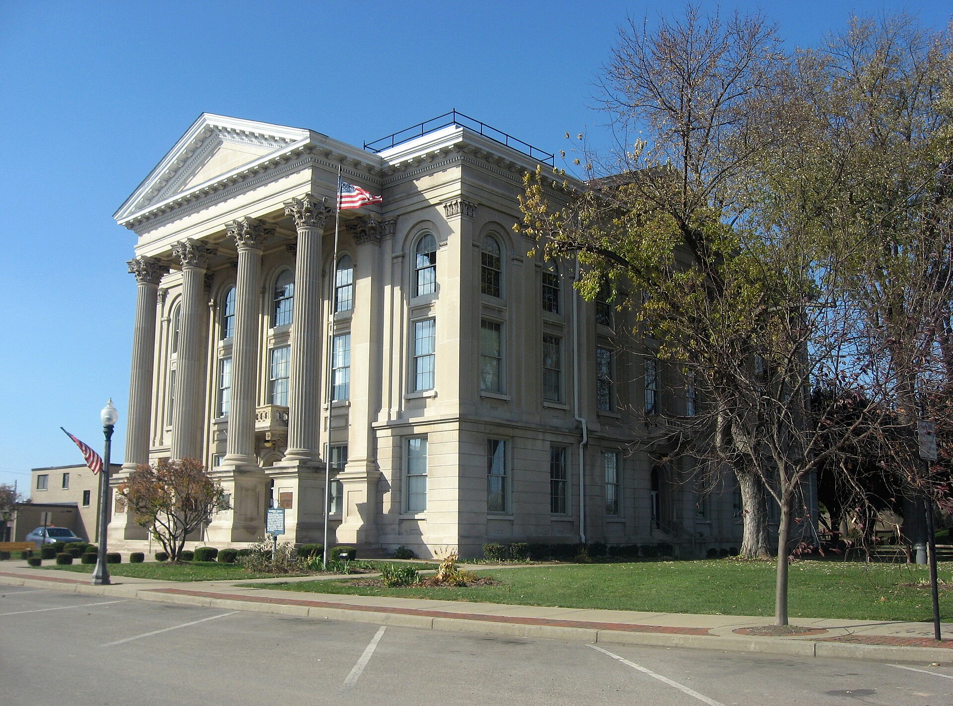 Front and eastern side of the Dearborn County Courthouse, located on the western corner of the junction of High and Mary Streets in Lawrenceburg, Indiana, United States.