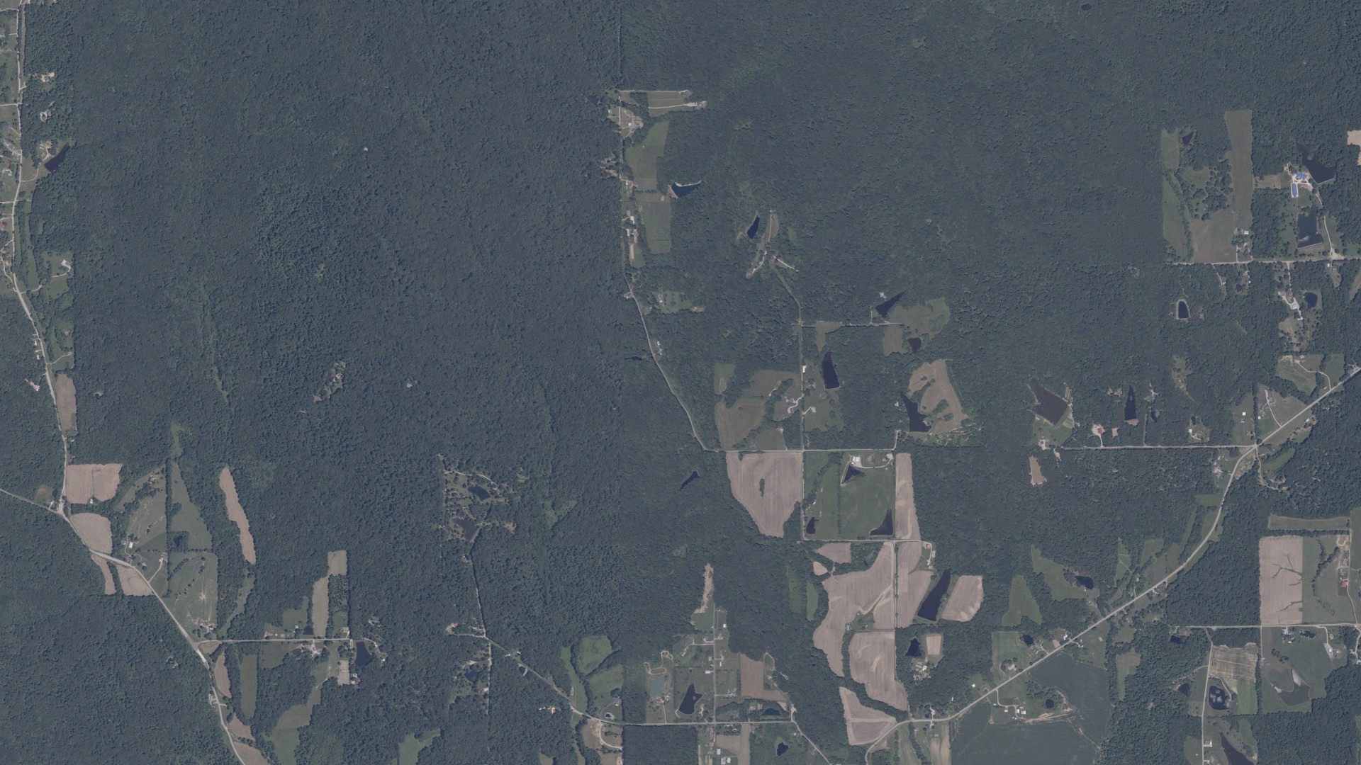 Natural-color aerial photograph of land around Pershing, Indiana
