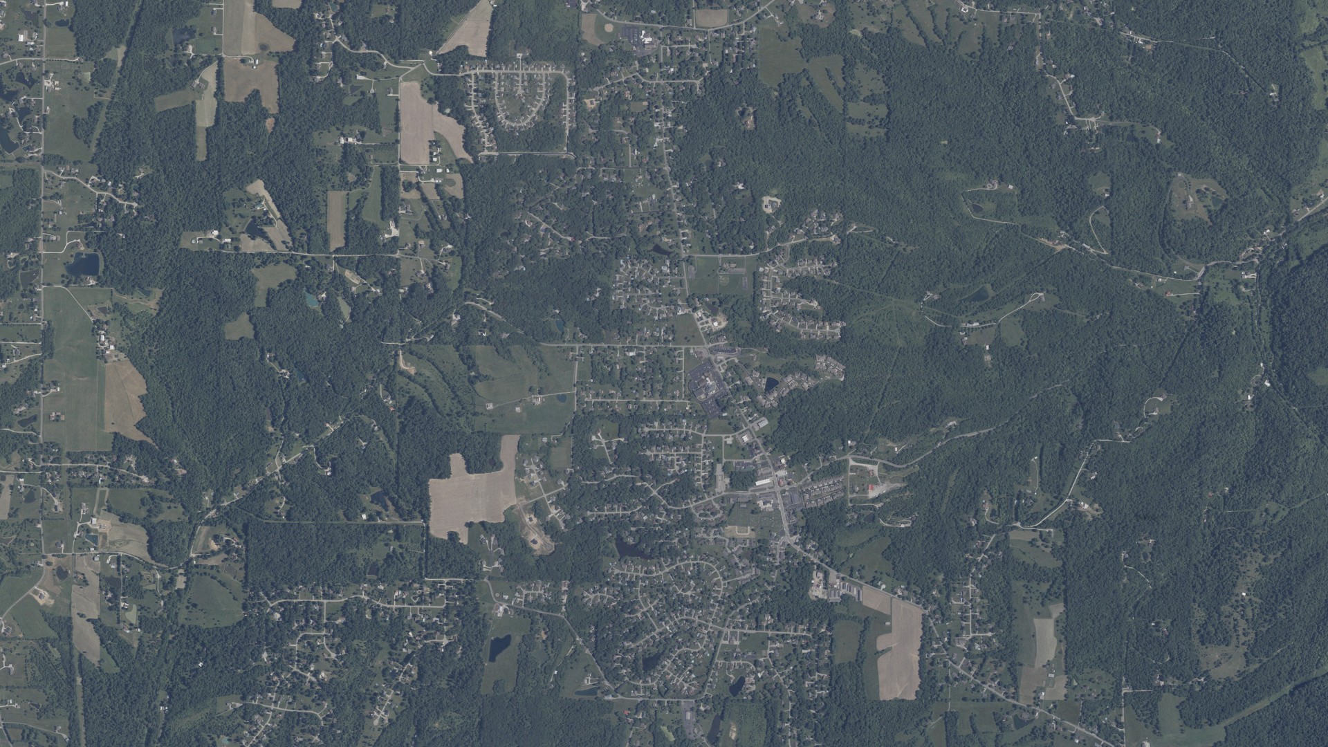 Natural-color aerial photograph of land around Bright, Indiana