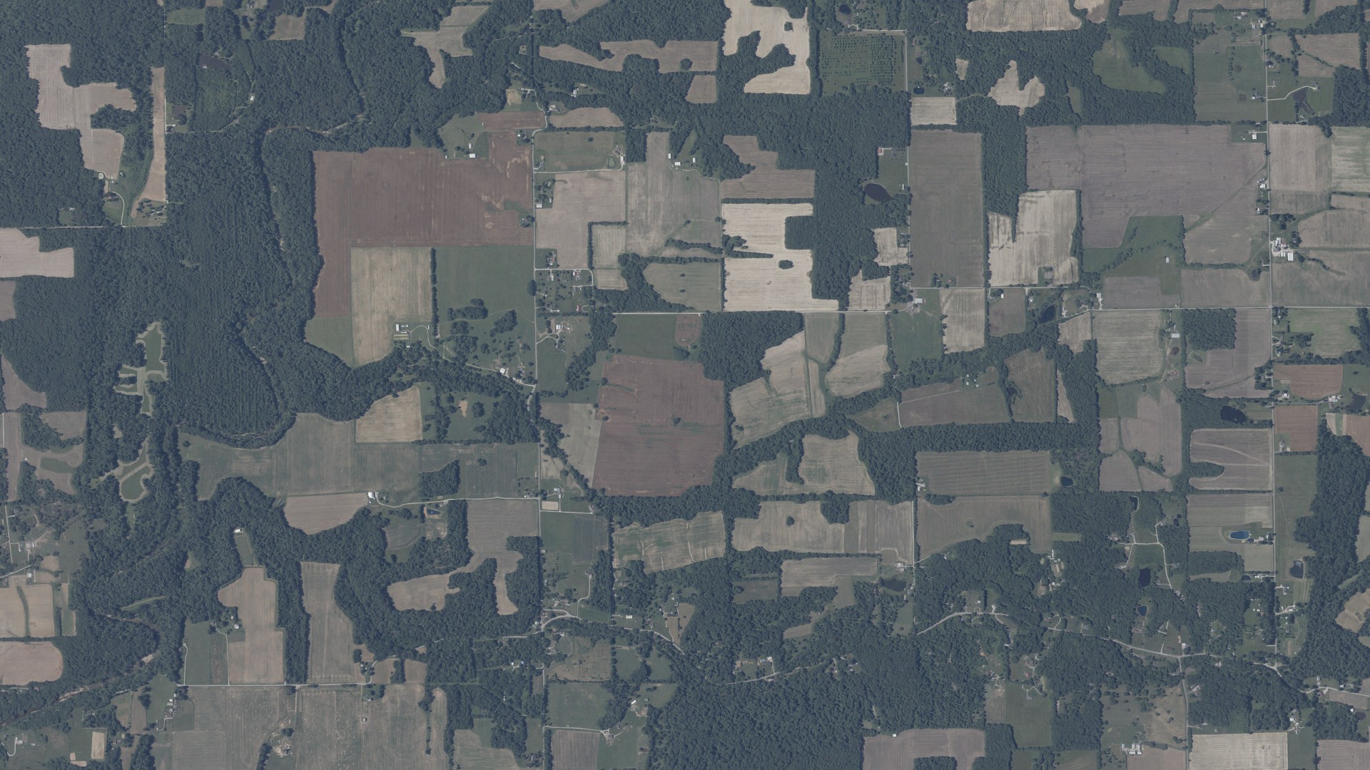 Natural-color aerial photograph of land around Smyrna, Indiana