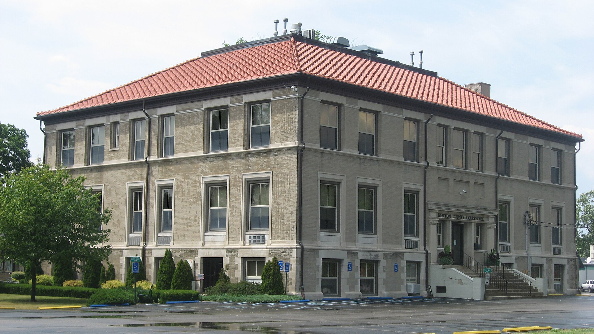 Eastern front and southern end of the Newton County Courthouse, located on Courthouse Square in Kentland, Indiana, United States.