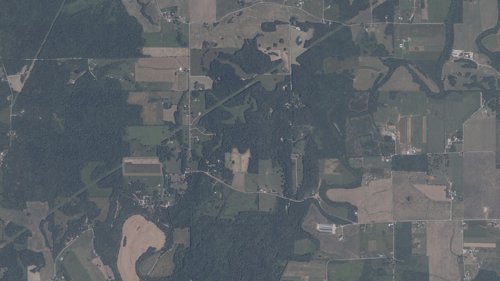 Natural-color aerial photograph of land around Orangeville, Indiana