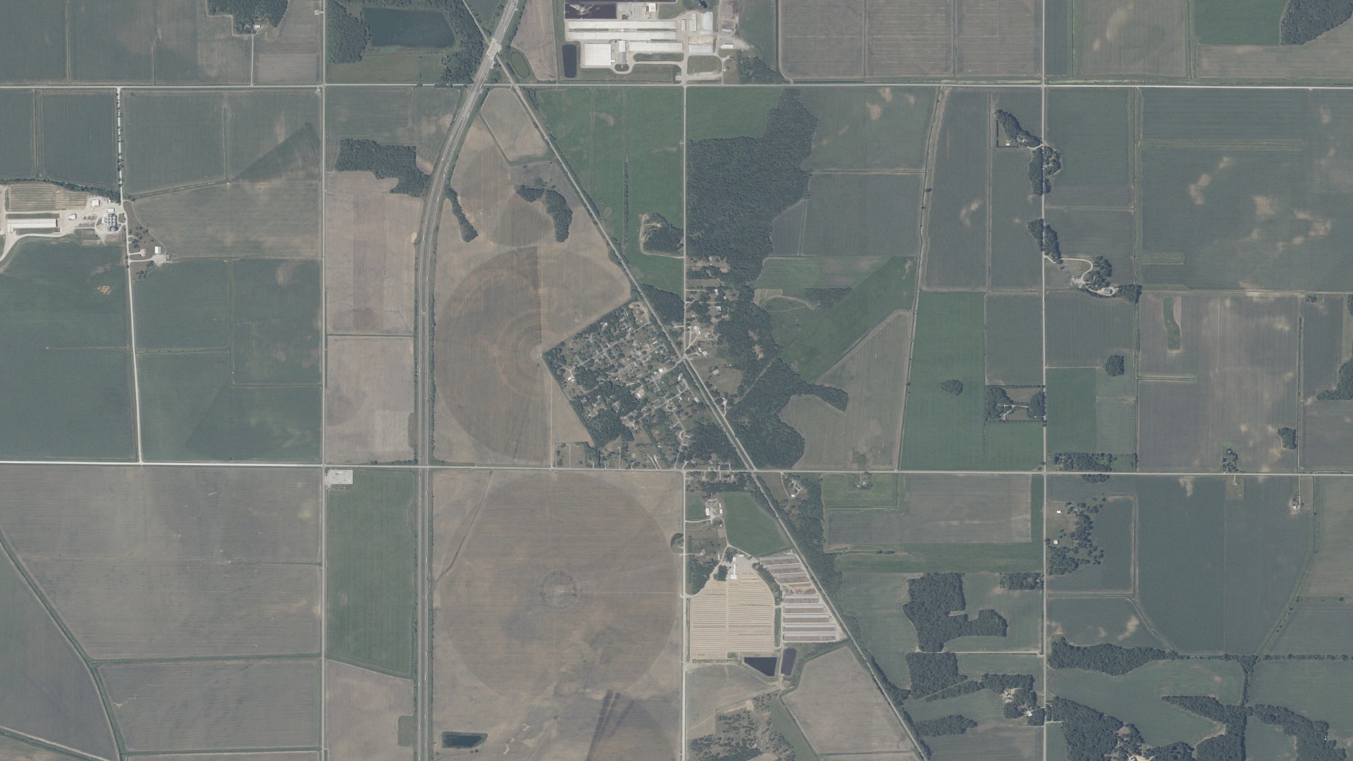 Natural-color aerial photograph of land around Fair Oaks, Indiana