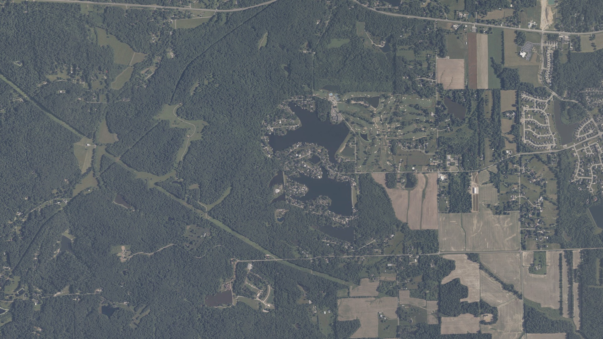 Natural-color aerial photograph of land around Harrison Lake, Indiana