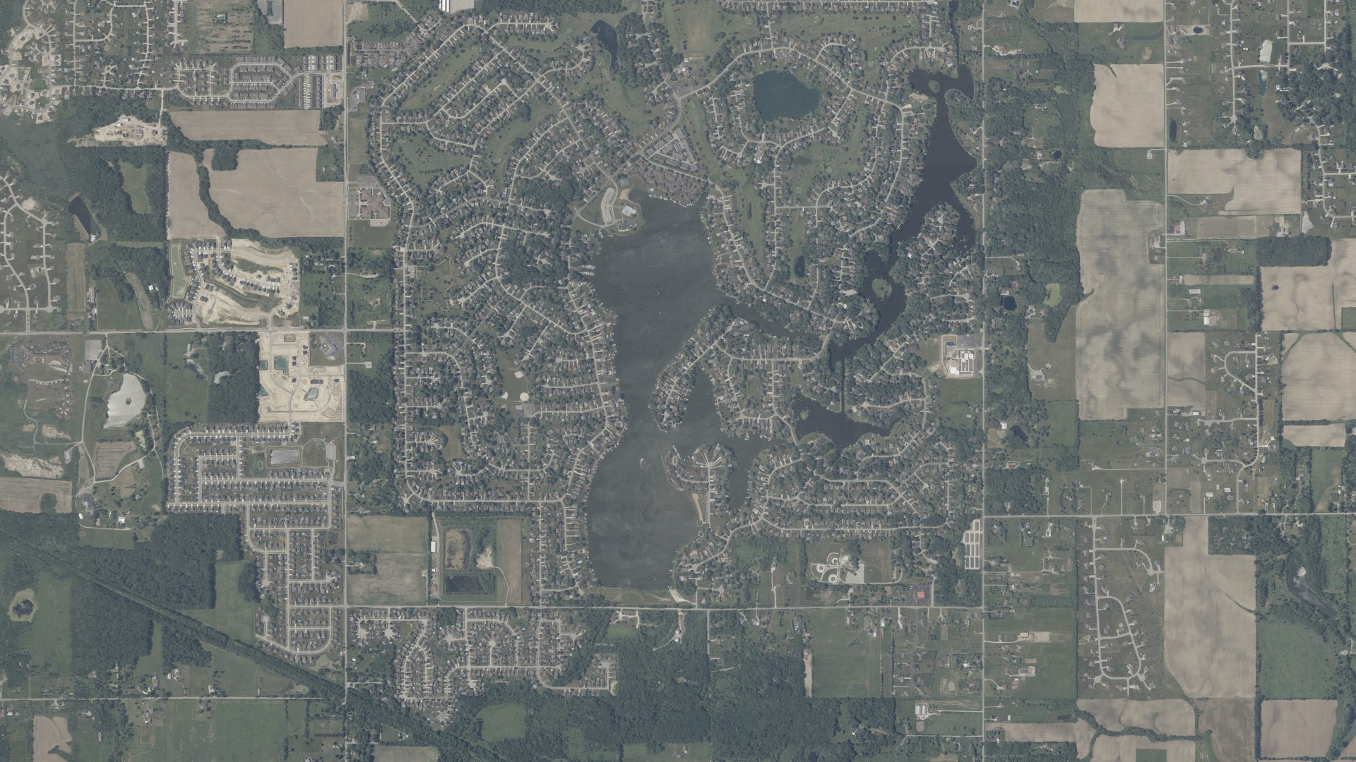 Natural-color aerial photograph of land around Lakes of the Four Seasons, Indiana