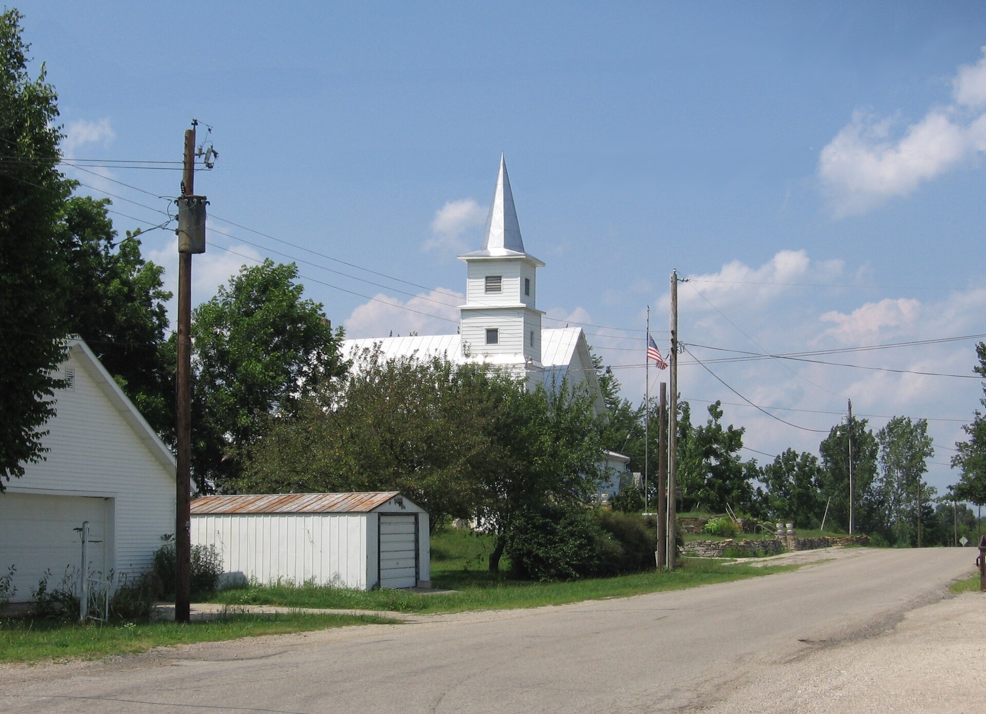Metz, Indiana, USA, looking north (NNW) from the main intersection toward the Metz Christian Church.