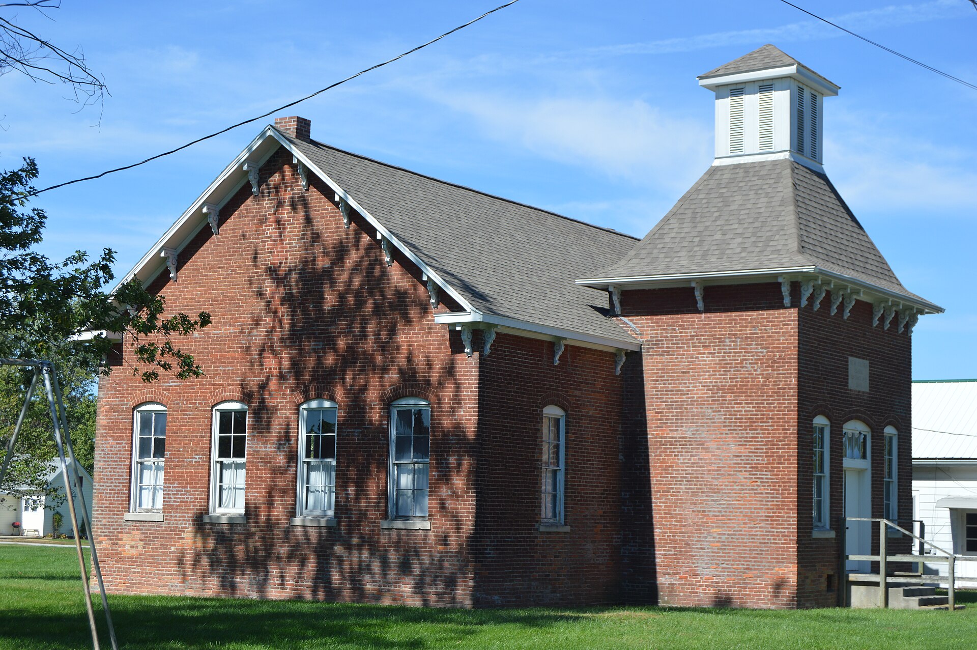Front and southern side of the New Goshen District No. 2 School, located at 9620 Rangeline Place in New Goshen, Indiana, United States. Built in 1888, it is listed on the National Register of Historic Places.