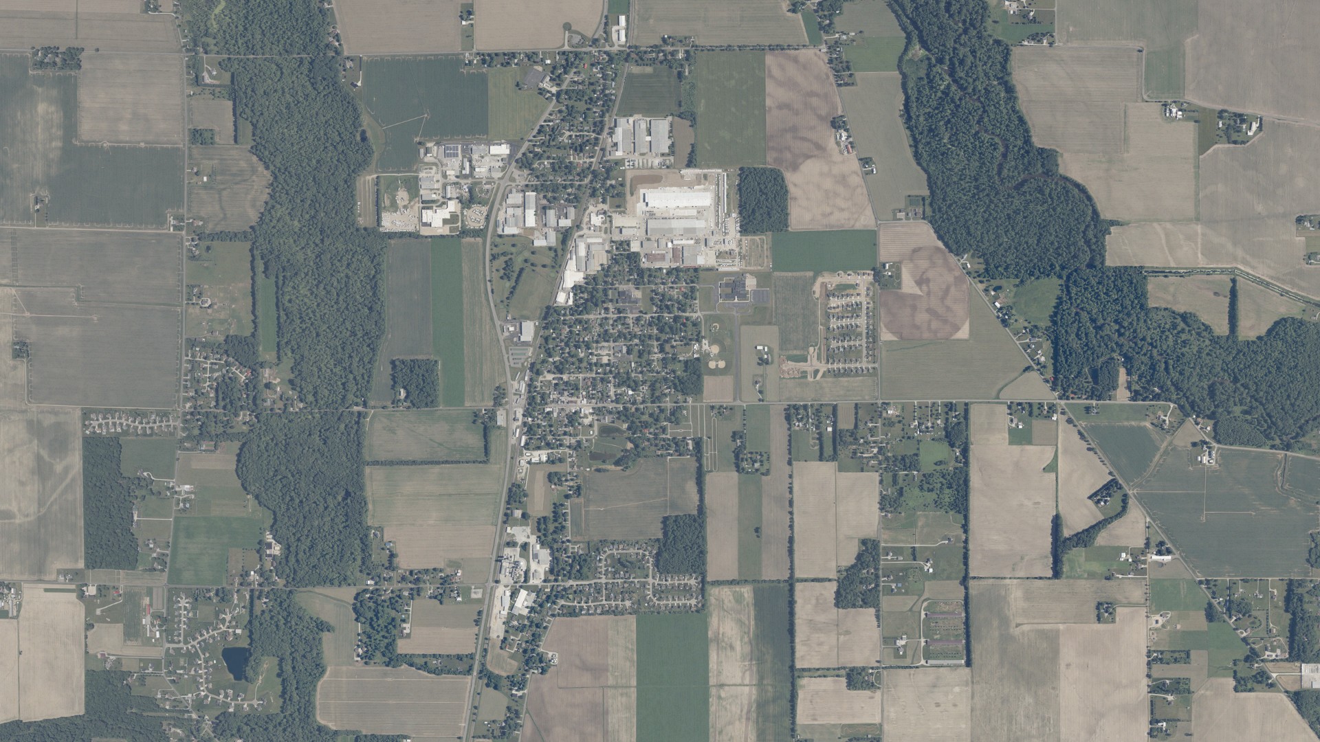 Natural-color aerial photograph of land around New Paris, Indiana