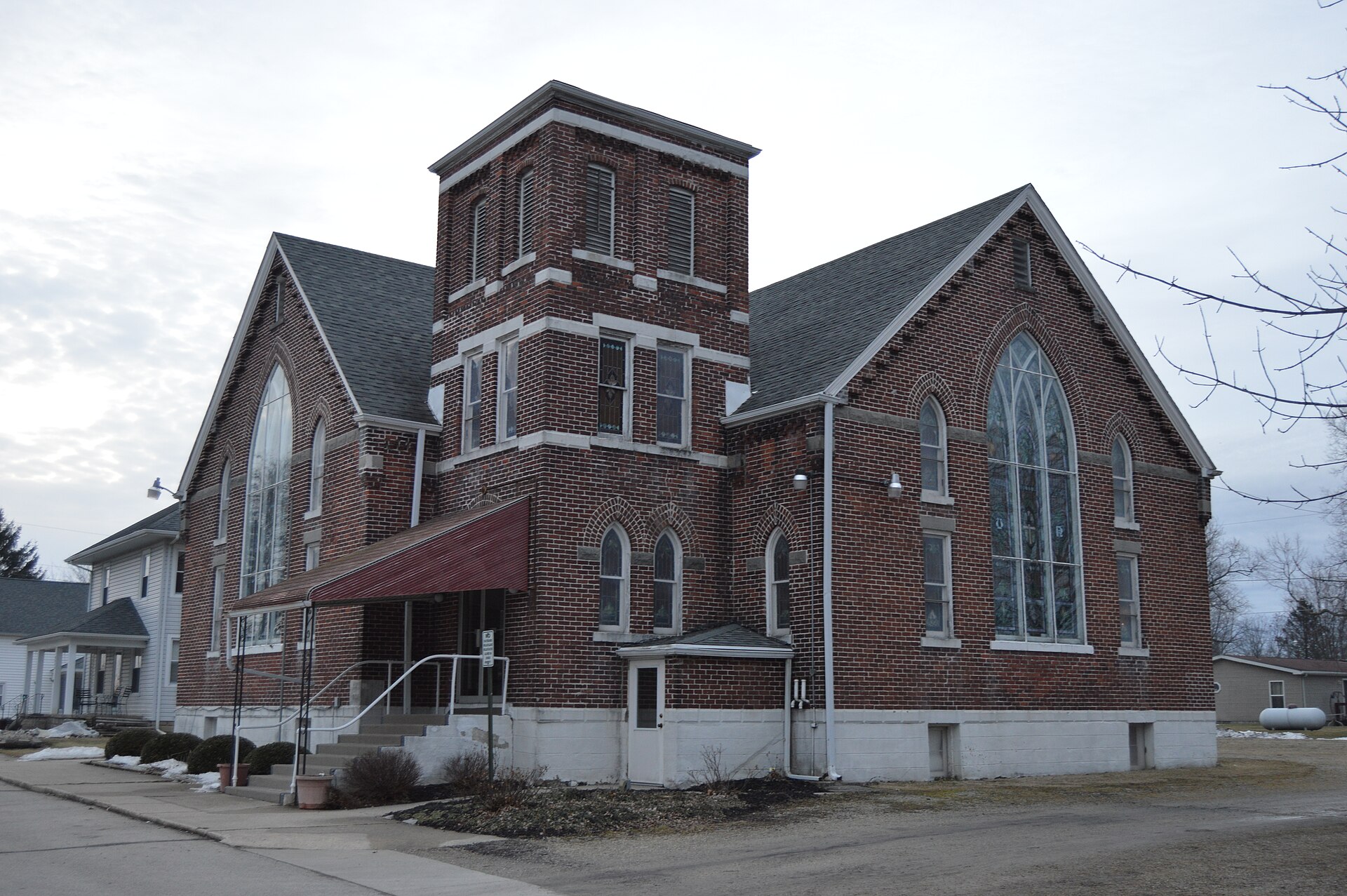 Front and western side of the Poneto United Methodist Church, located at 36 E. Walnut Street in Poneto, Indiana, United States.