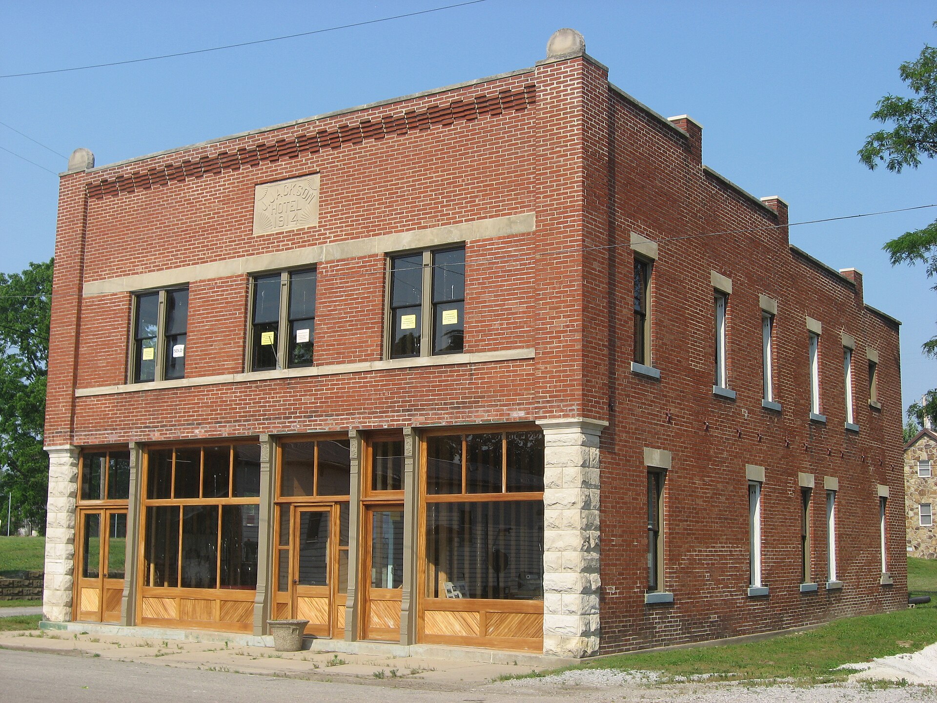 Southern side and front of the Joseph Jackson Hotel, located at 2420 S. Main Street in Vallonia, Indiana, United States. Built in 1914, it is listed on the National Register of Historic Places.