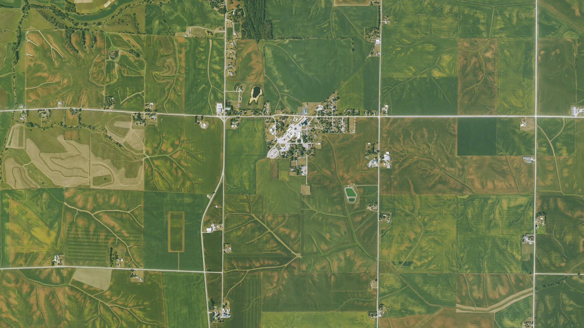 Natural-color aerial photograph of land around Conroy, Iowa