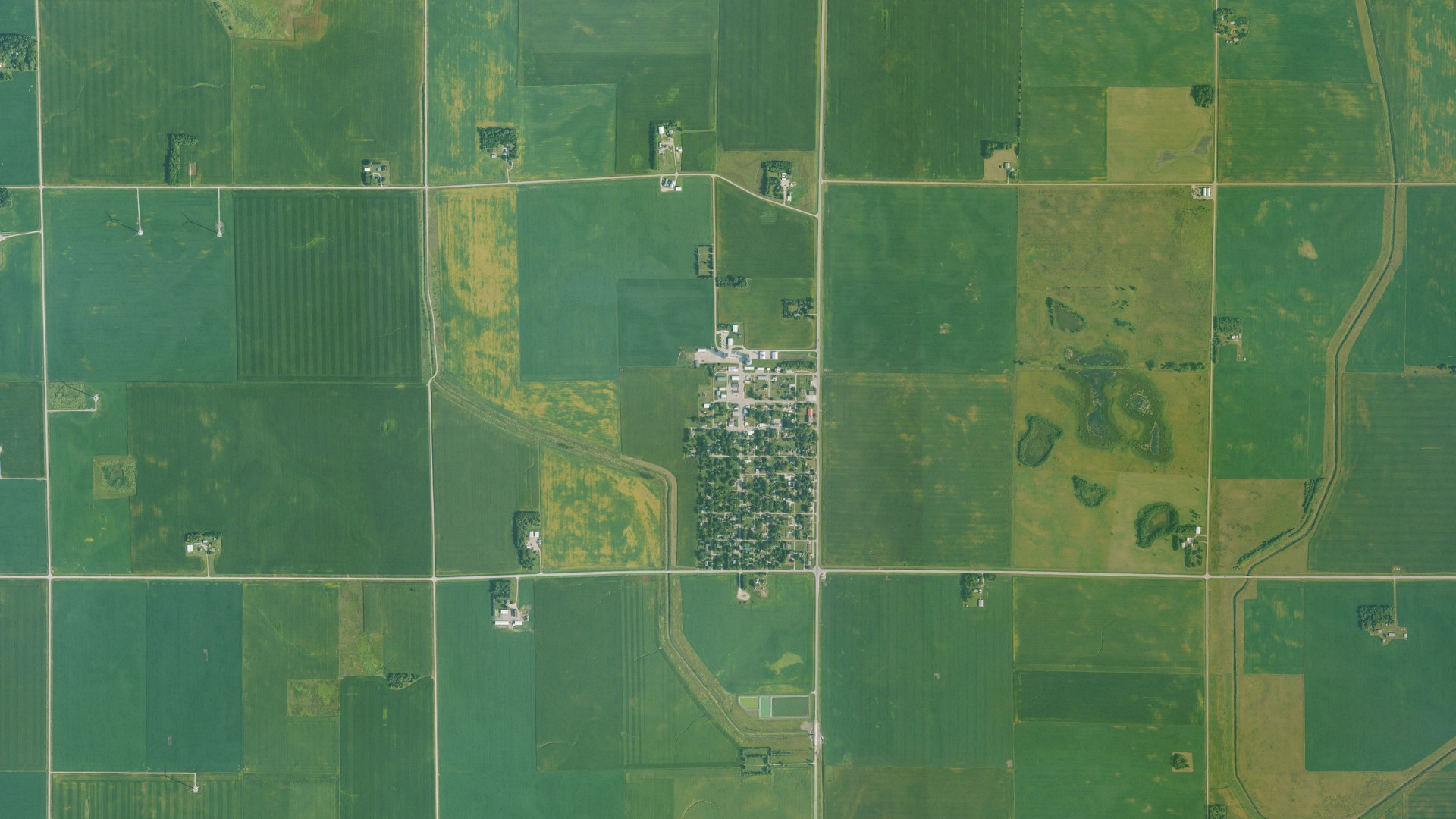 Natural-color aerial photograph of land around Fenton, Iowa