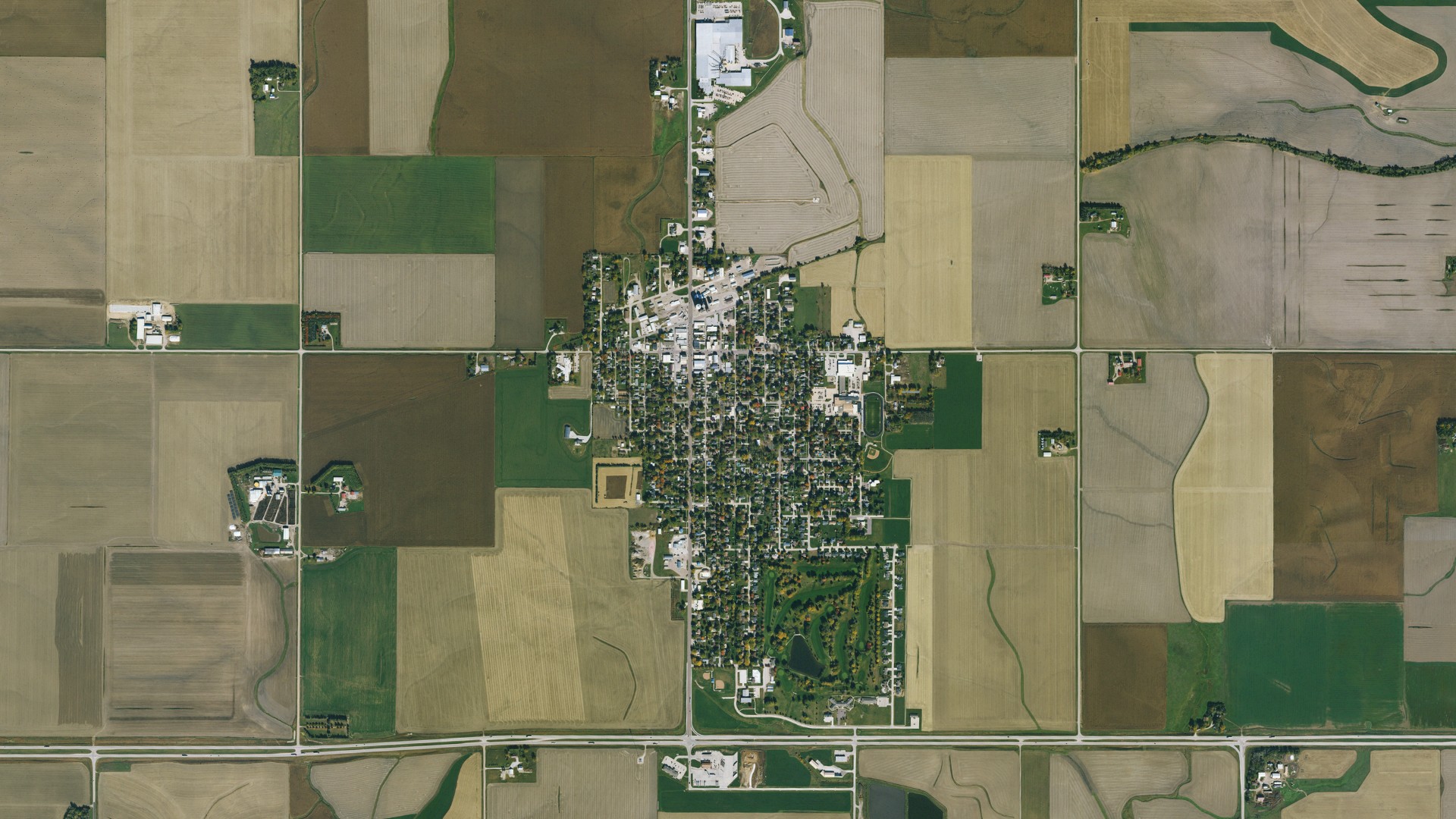 Natural-color aerial photograph of land around Holstein, Iowa