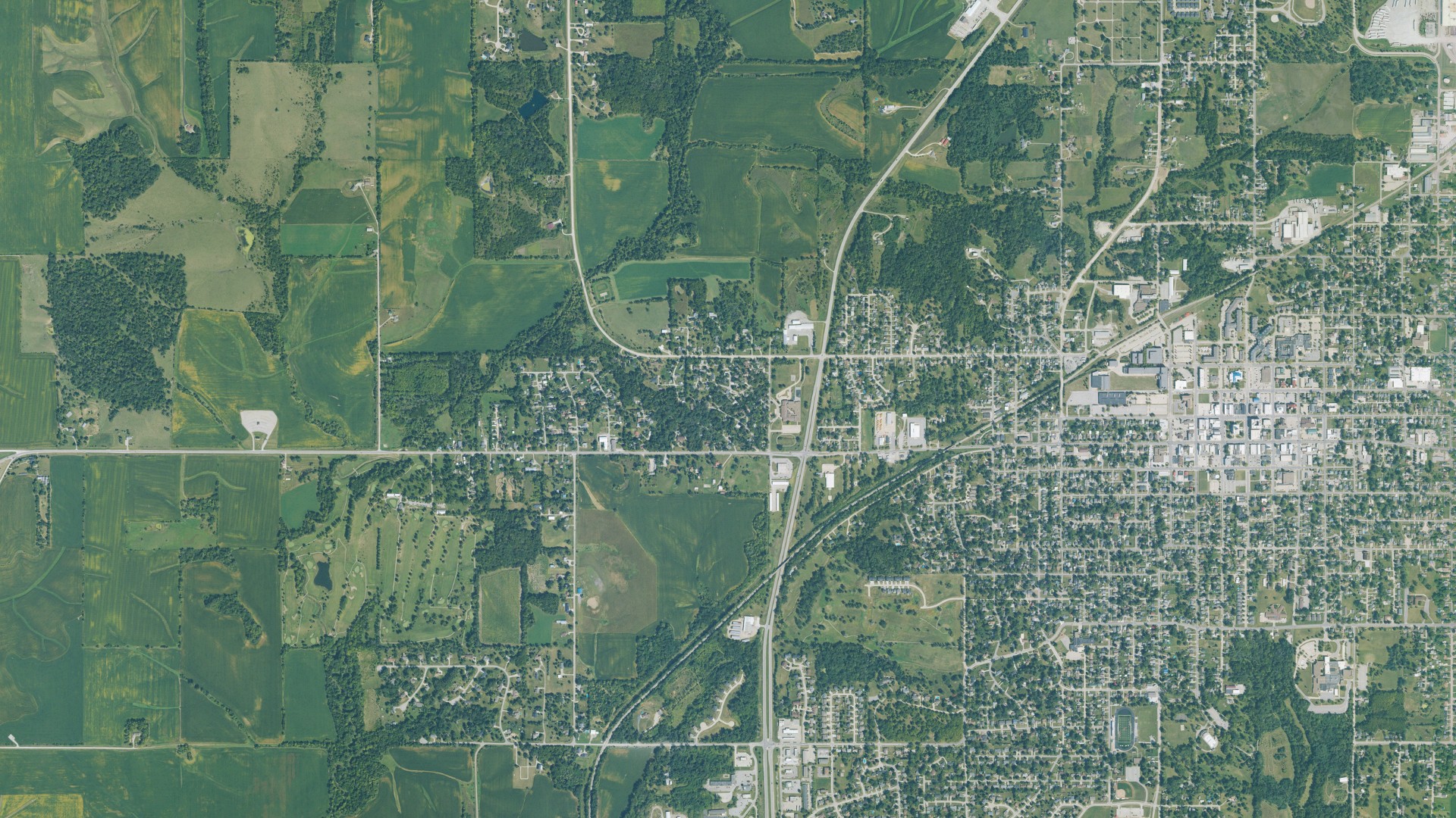 Natural-color aerial photograph of land around Lambs Grove, Iowa