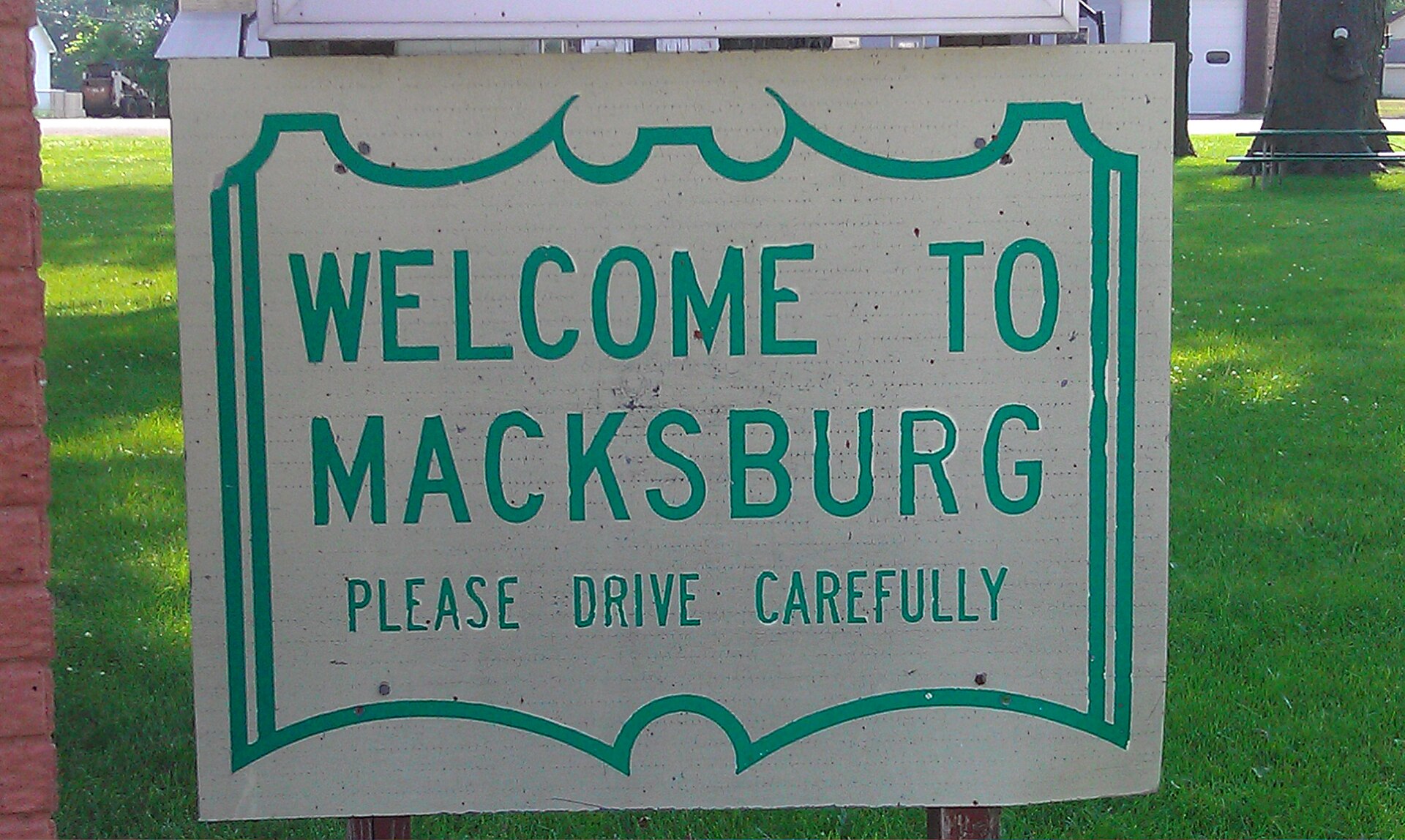 A welcome sign located in the city park of Macksburg, Iowa, USA.