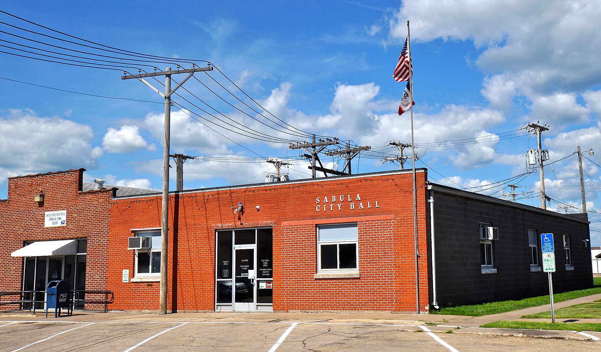 Sabula City Hall located at Sabula, Jackson County, Iowa. At left is the city post office.