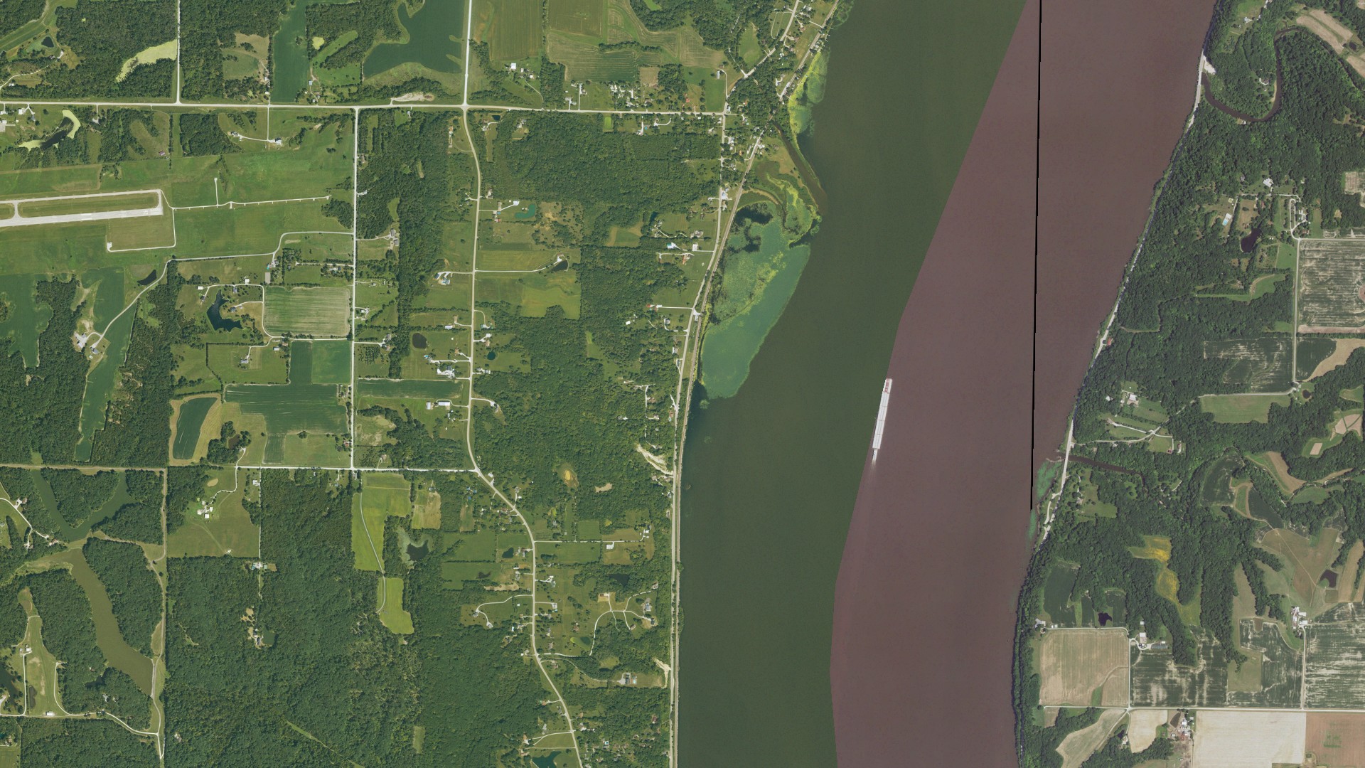 Natural-color aerial photograph of land around Sandusky, Iowa