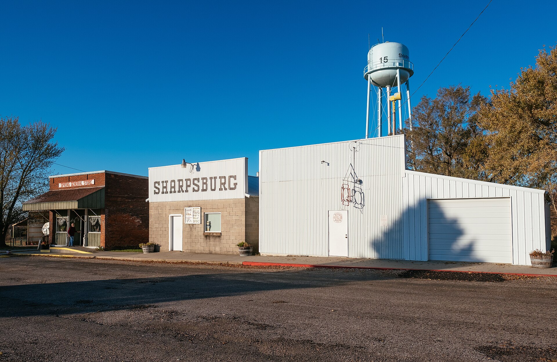 Wabash Street. Harold Spring seen in front of Spring General Store. He and his wife, Linda, have run the store since October of 1972. — Sharpsburg, Iowa