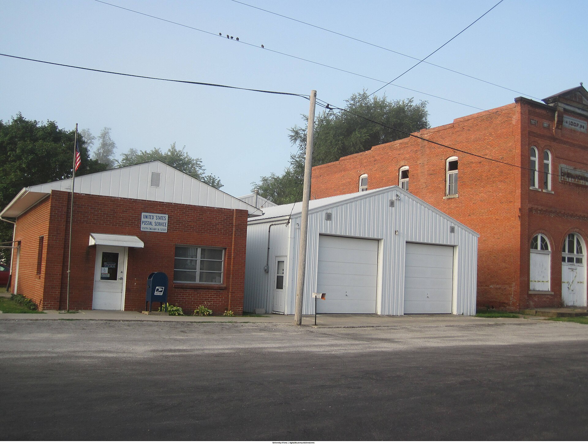 This picture shows the South English, Iowa post office and Odd Fellows Hall as they appeared in August of 2013.