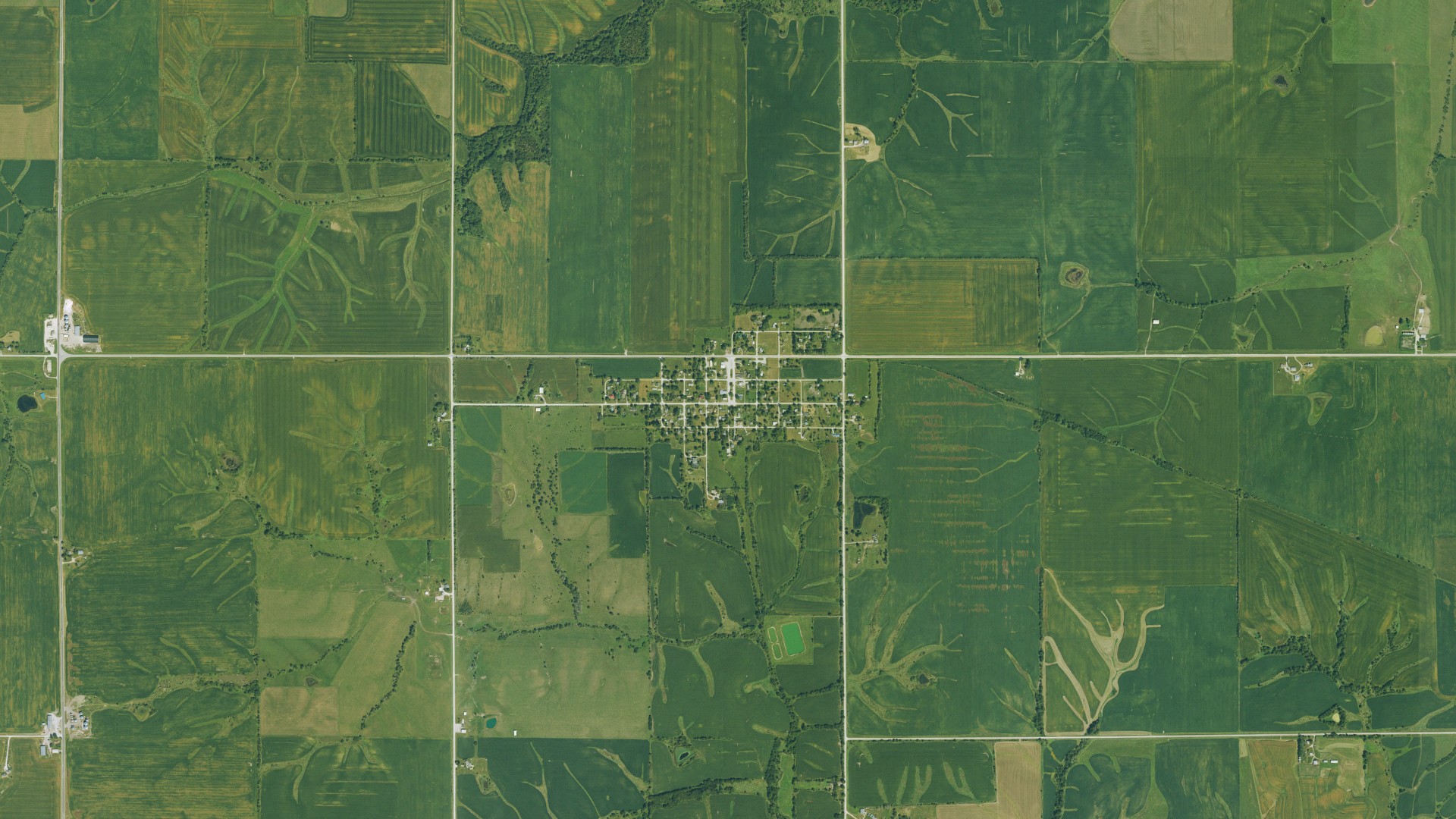 Natural-color aerial photograph of land around Weldon, Iowa