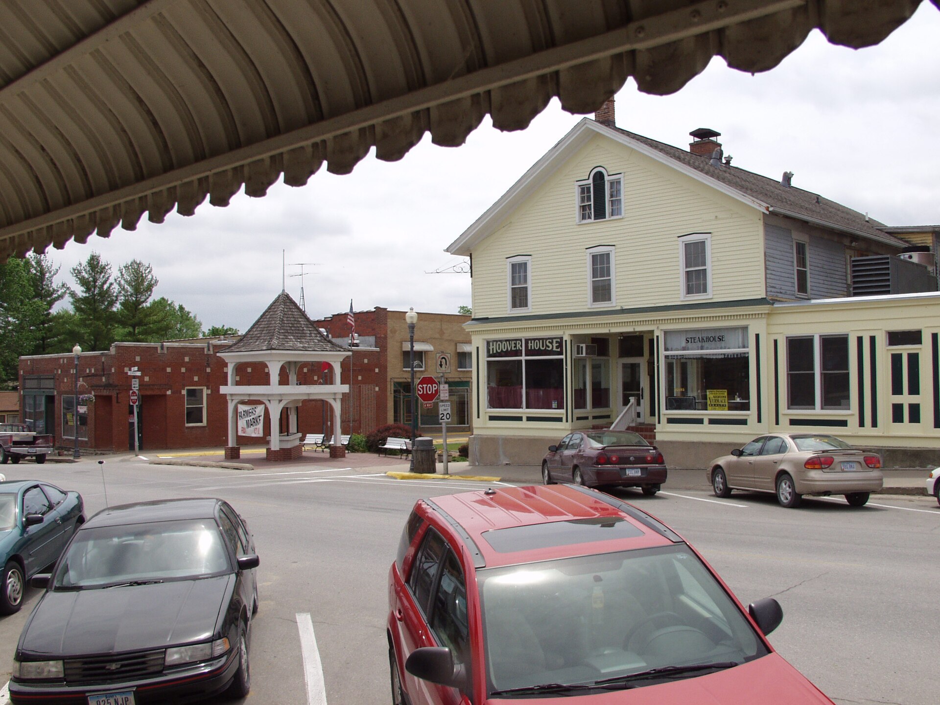 West Branch, Iowa. I, Rob Poggenklass, took this picture in June 2005. It is a photograph of the center of downtown West Branch, and includes the Hoover House as well as the gazebo in Heritage Square.