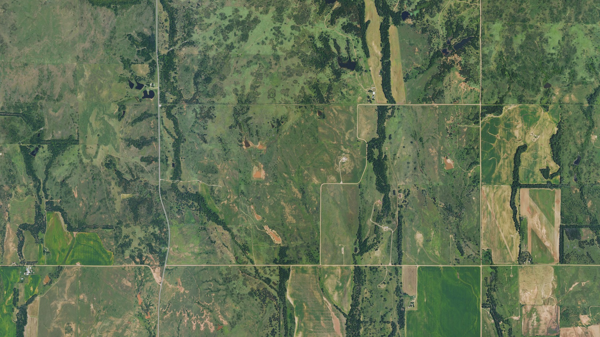Natural-color aerial photograph of land around Sharon, Kansas
